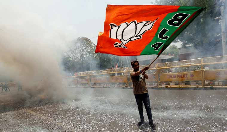 Bjp Flag Waved By A Lone Supporter
