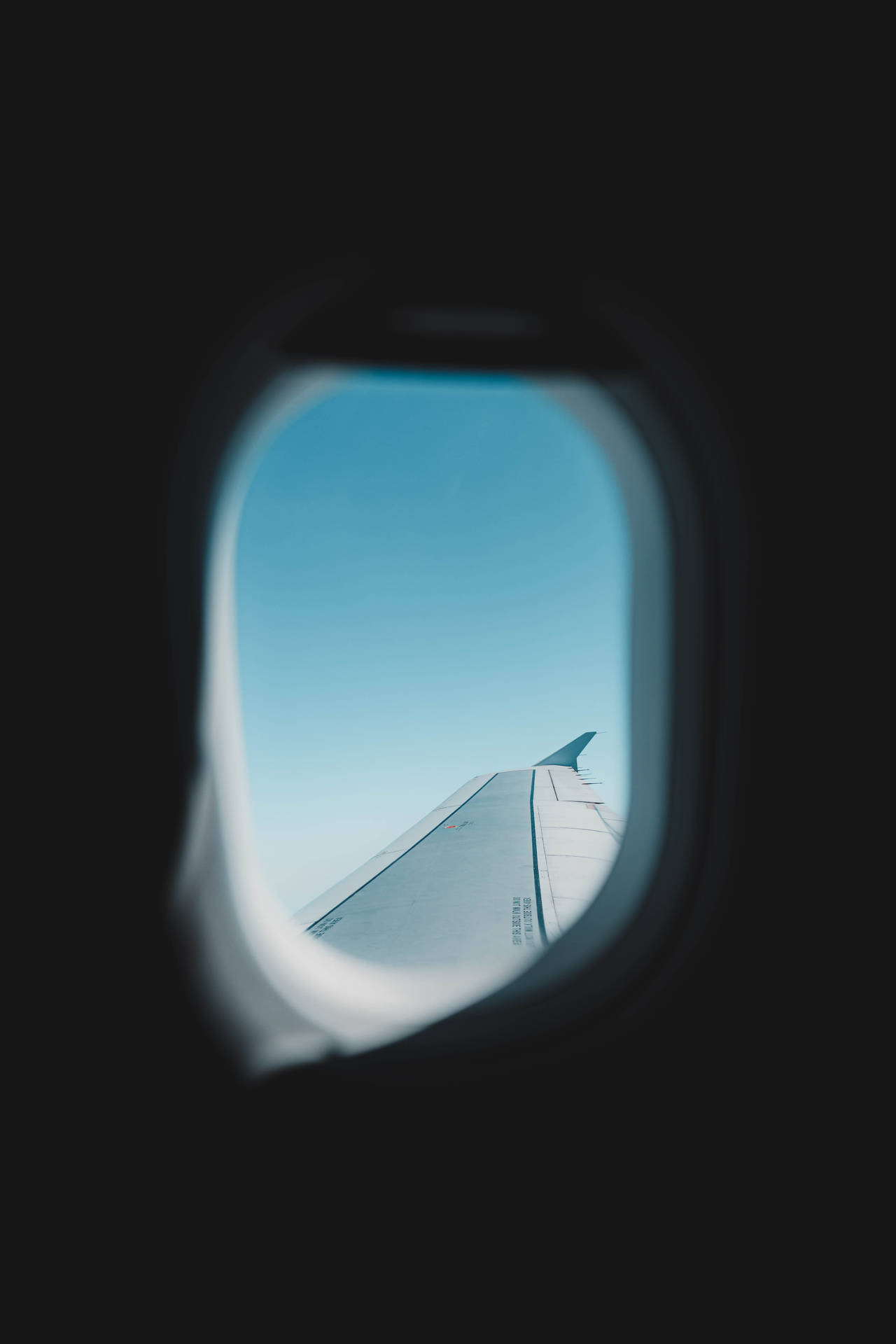 Blå Udsigt Fra Plane Window Seat Wallpaper