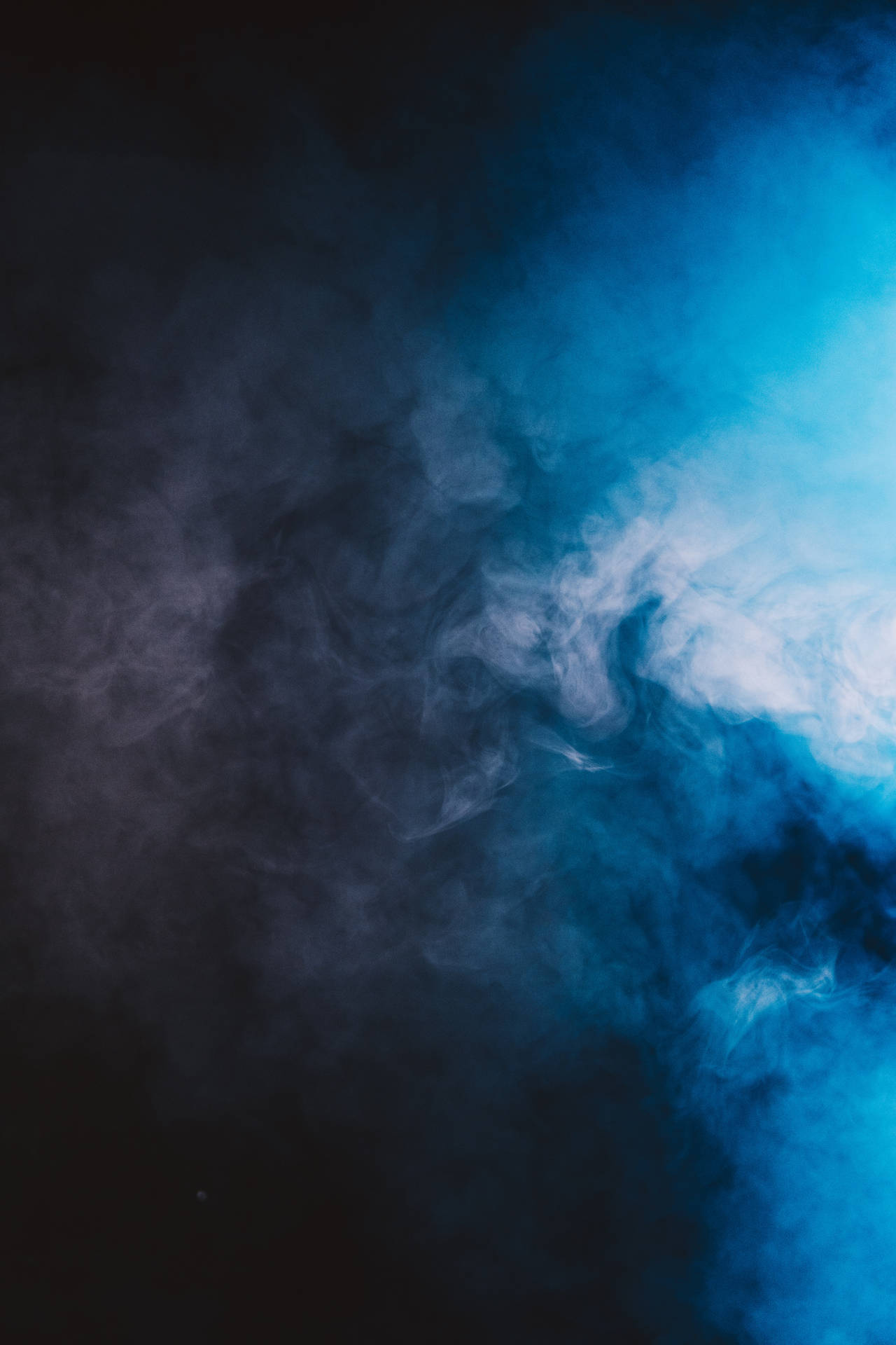 Download Enjoy the tranquility of blue and black smoke Wallpaper