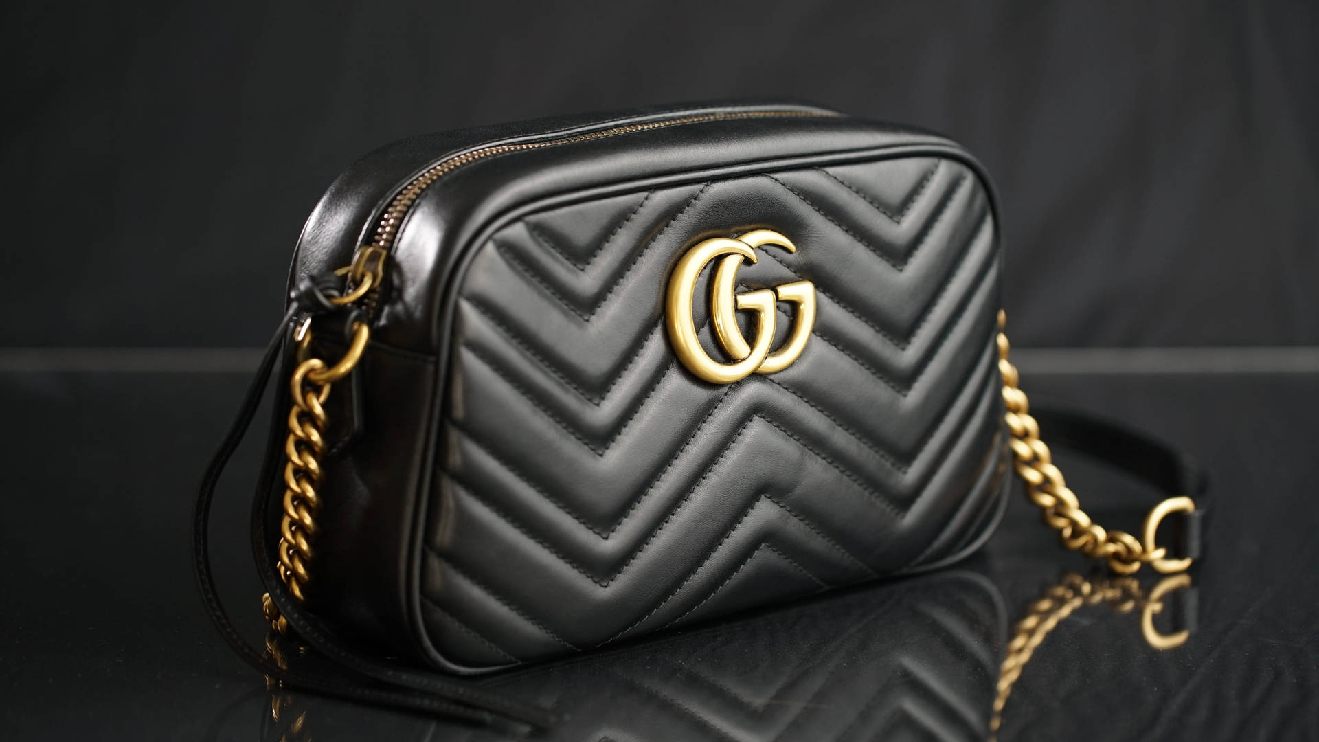 Black And Gold Gucci Bag Wallpaper