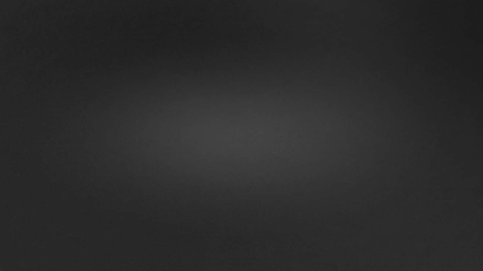A Black Background With A White Square