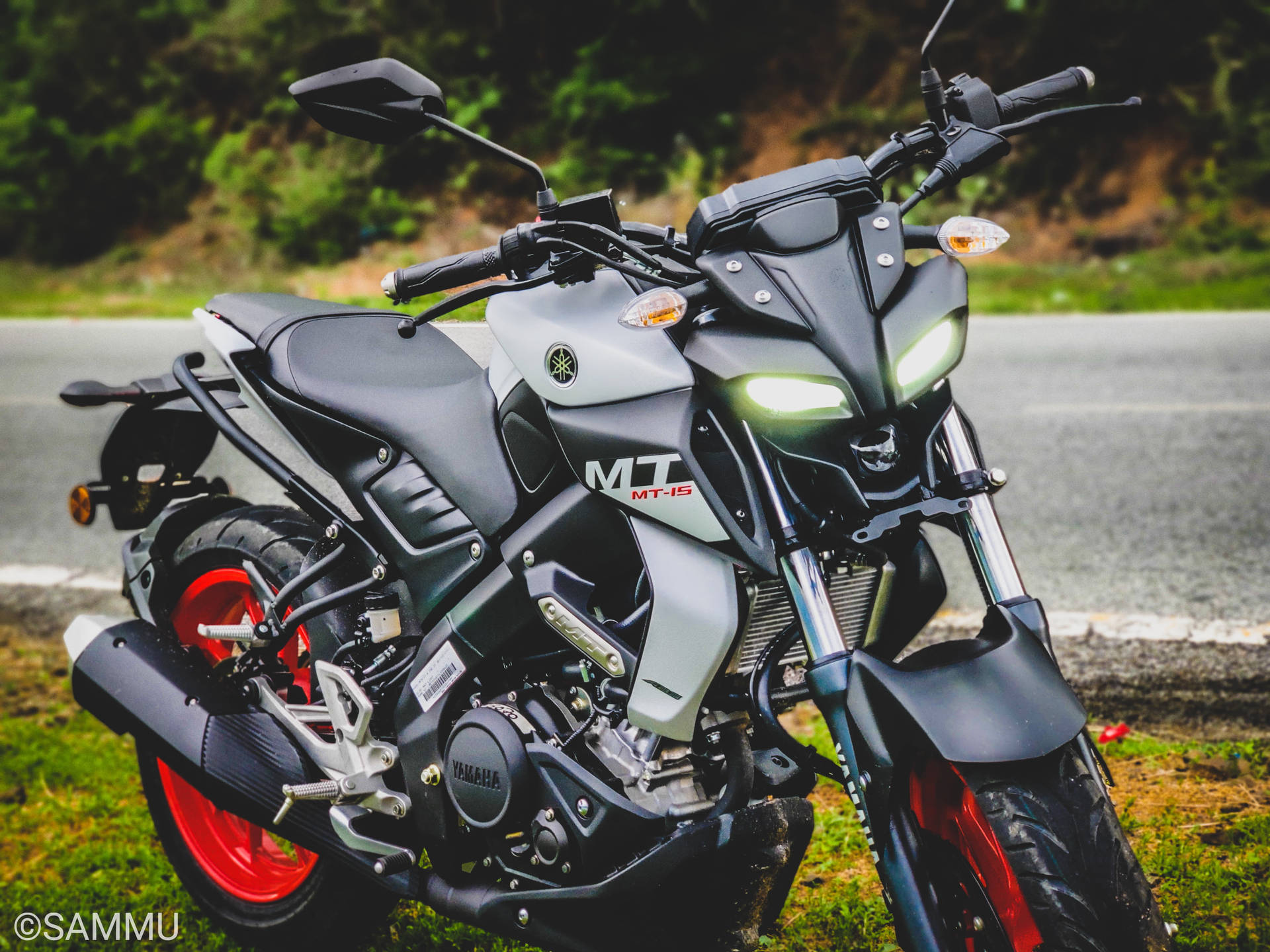 Black And Grey Yamaha Mt 15 With Red Rims Wallpaper