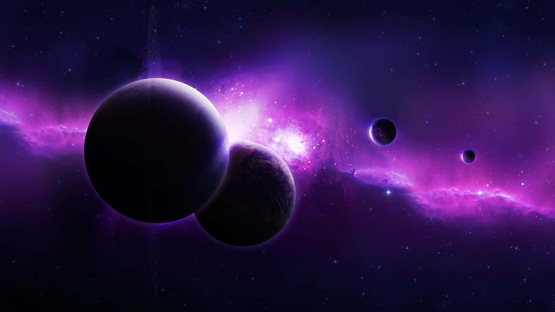 “Dark and Dreamy: A stunning shot of the Black and Purple Galaxy in space.” Wallpaper