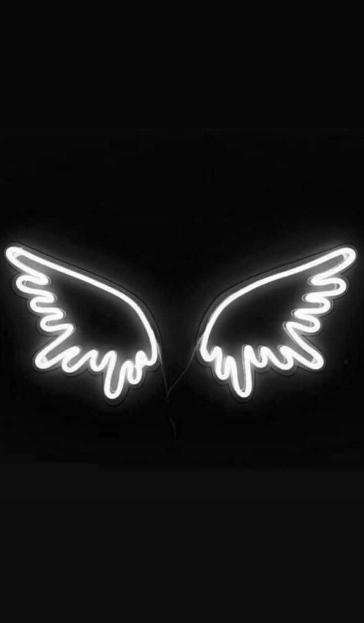 Neon Angel Wings On A Black Background Wallpaper