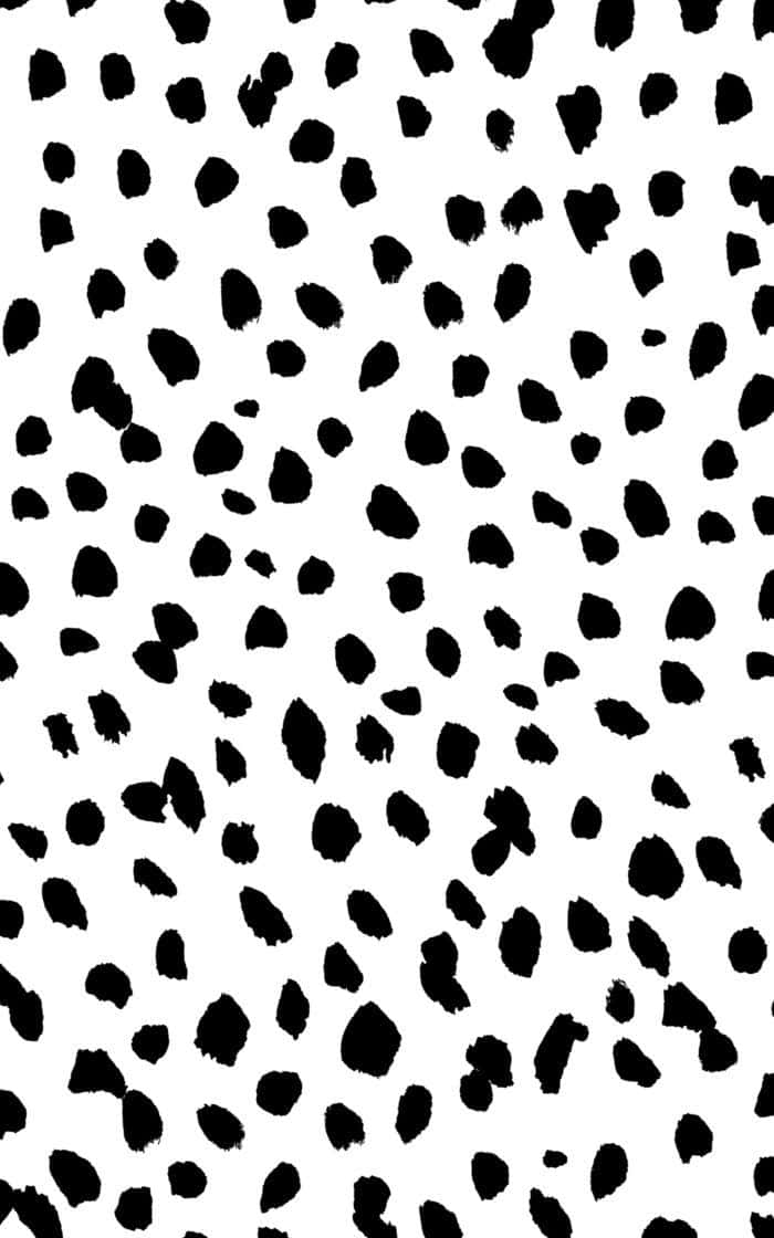 A Black And White Pattern With Spots Wallpaper