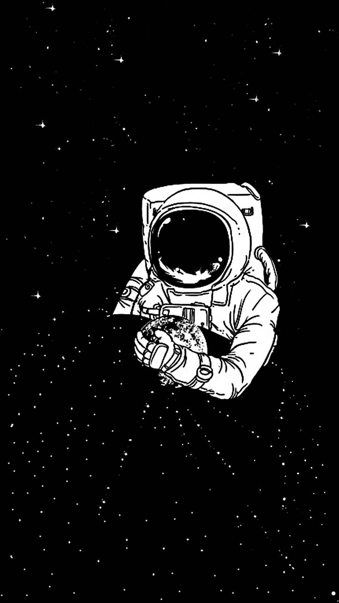 En sort og hvid astronaut står foran stjernerne. Wallpaper