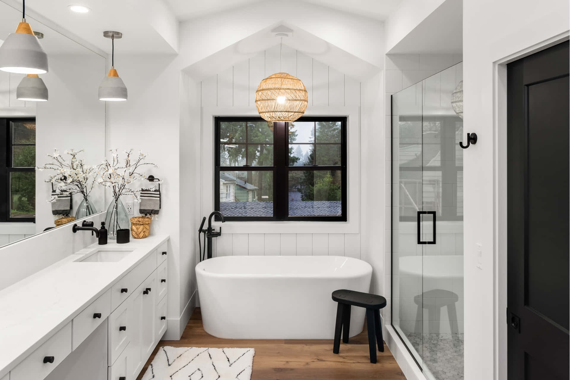 A splash of black and white contrasts in a modern bathroom
