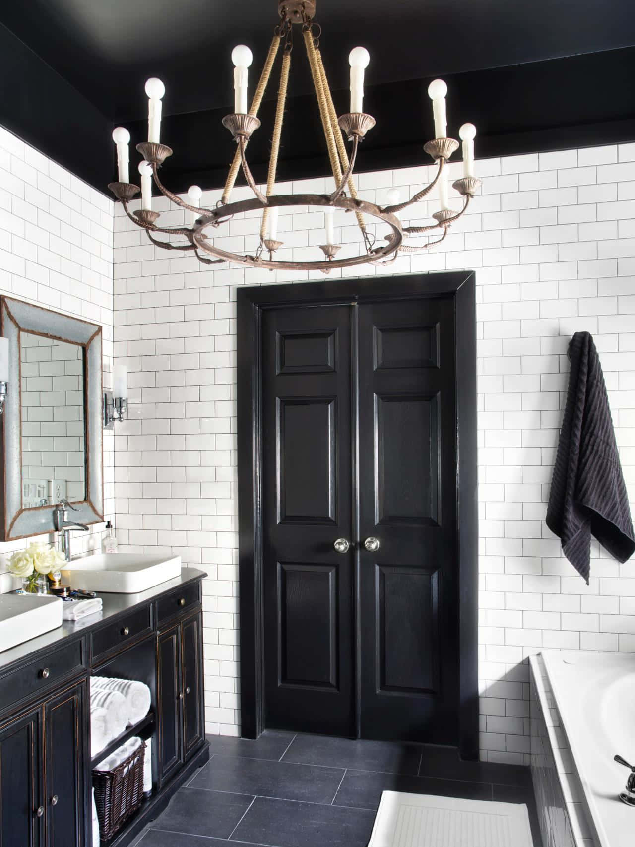 Contemporary black and white bathroom surrounded with natural light