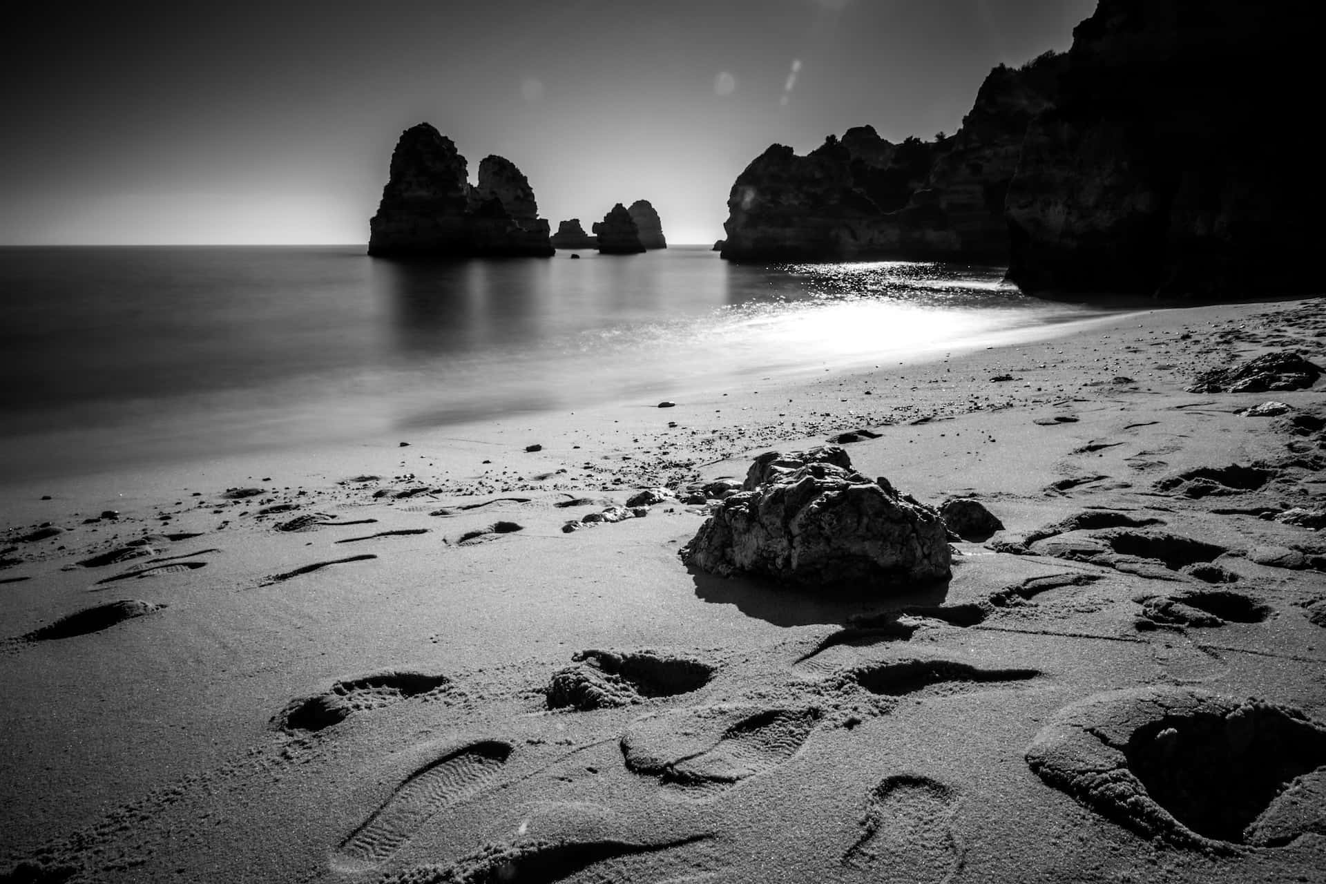 Tranquil Black and White Beach Landscape Wallpaper