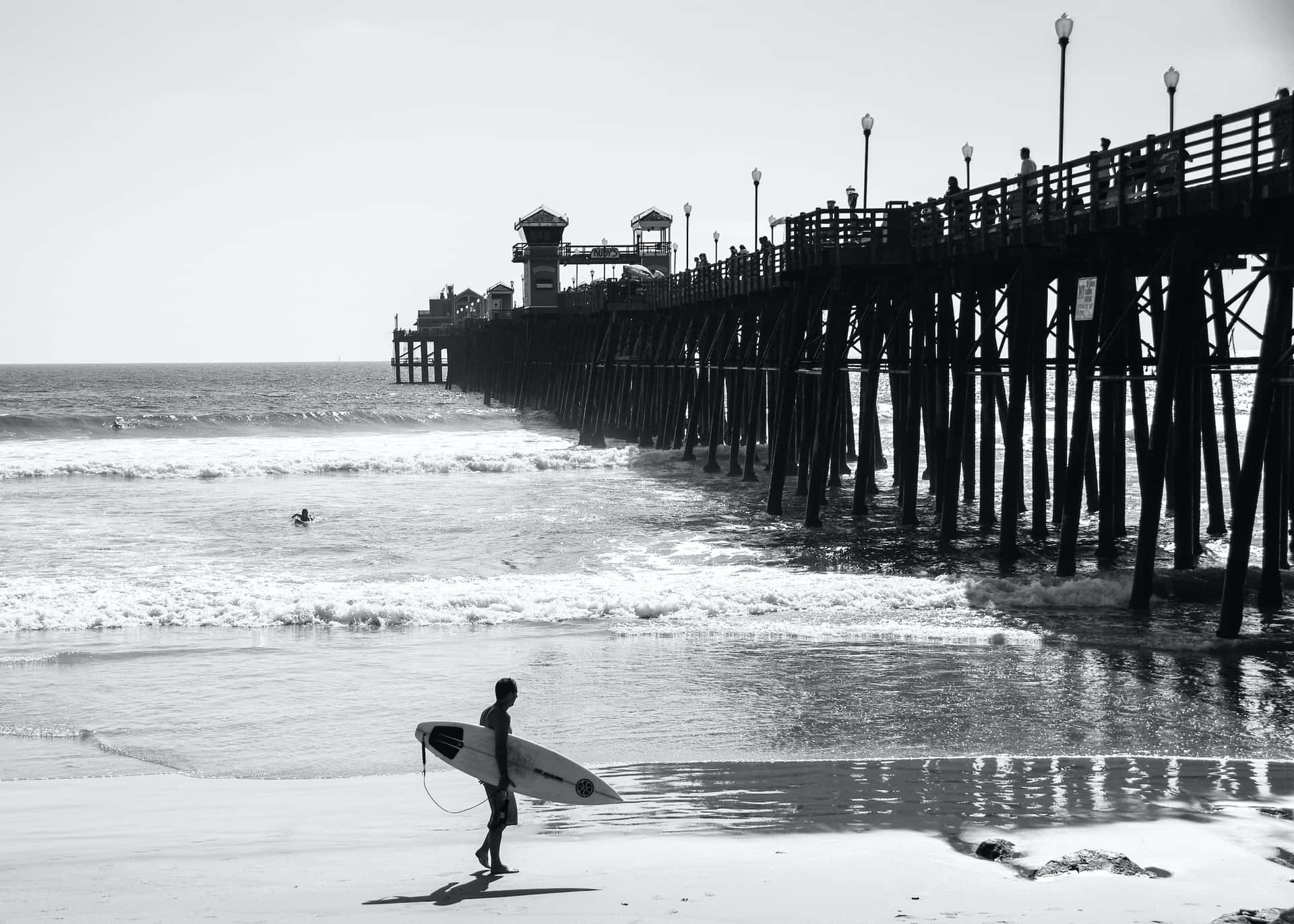 Caption: Tranquil Black and White Beach Wallpaper