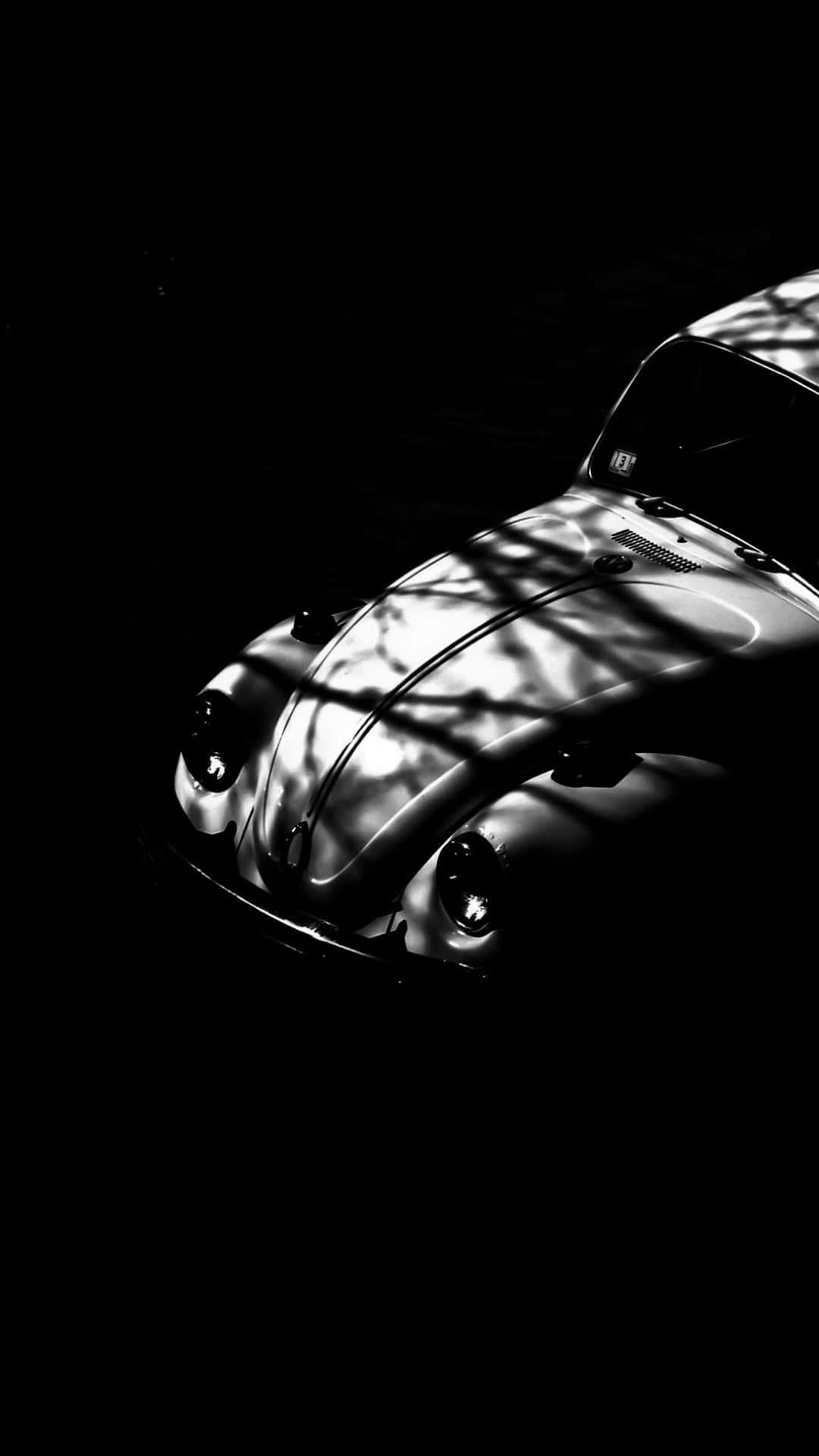 Caption: Stylish Black and White Car Wallpaper