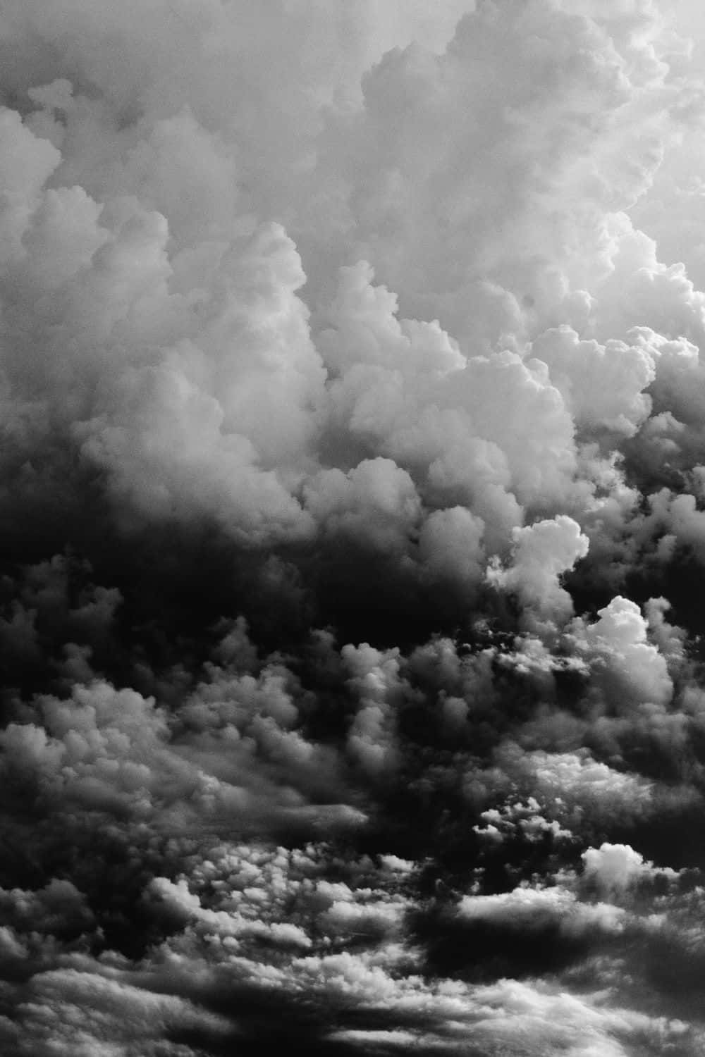 "Dreamy Contrast of Black and White Clouds" Wallpaper