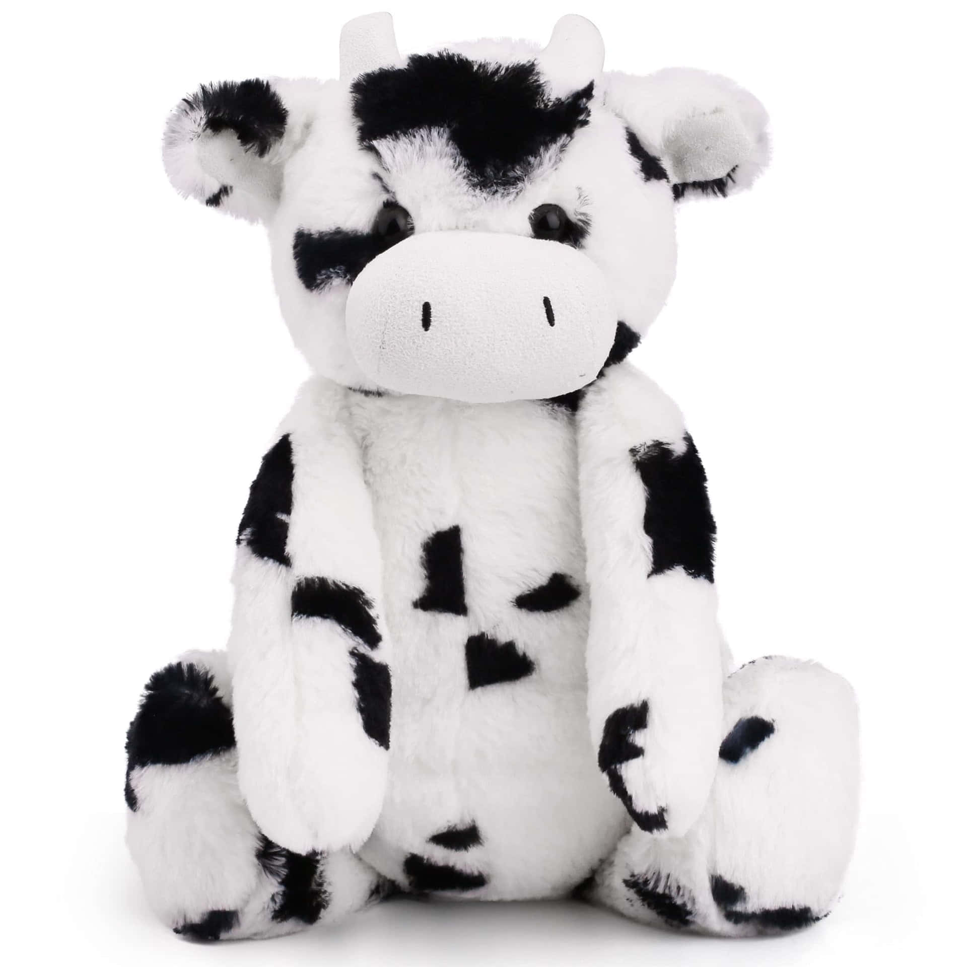 A Black And White Cow Stuffed Animal