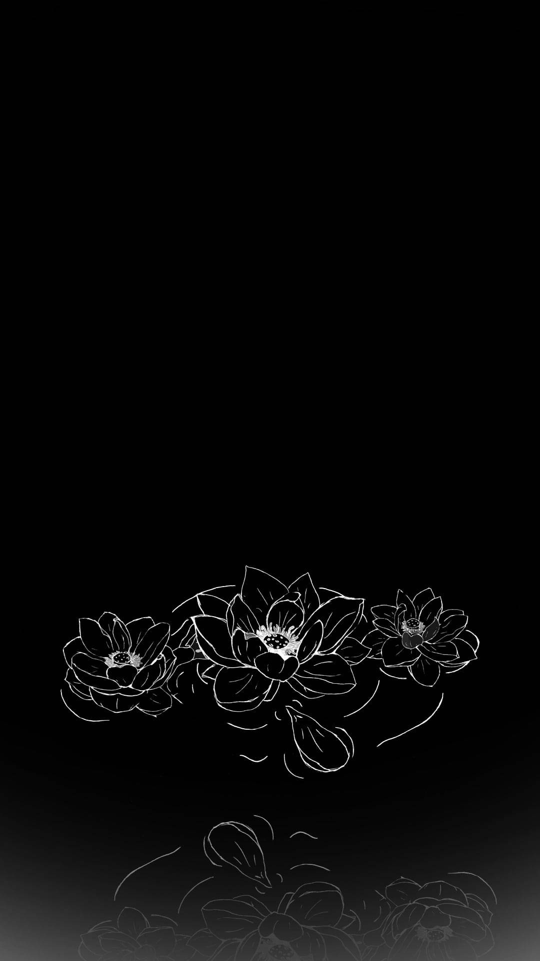 Caption: Majestic Trio of Black and White Flowers Wallpaper