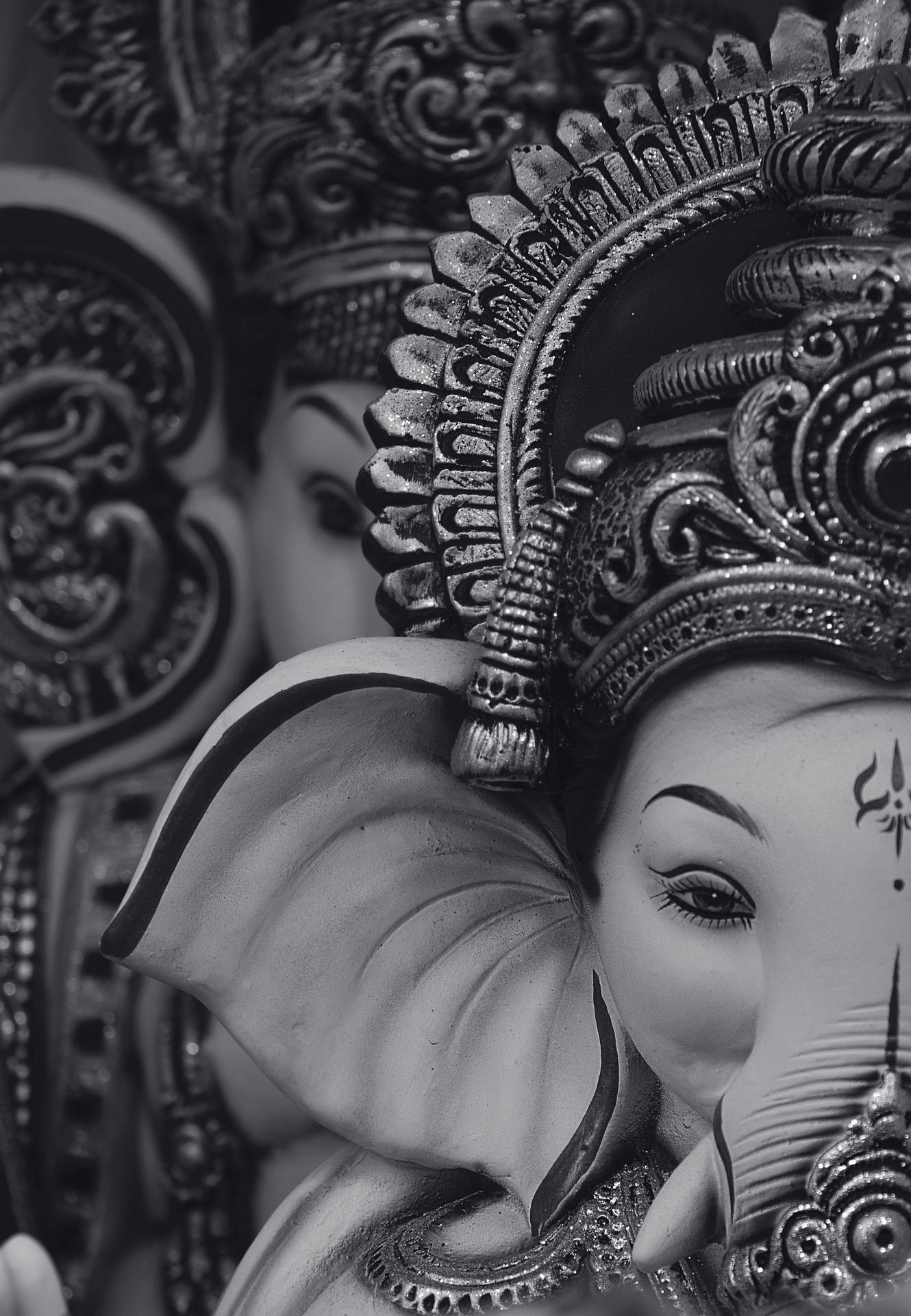 Divine Black and White Ganesha Illustration on Mobile Wallpaper