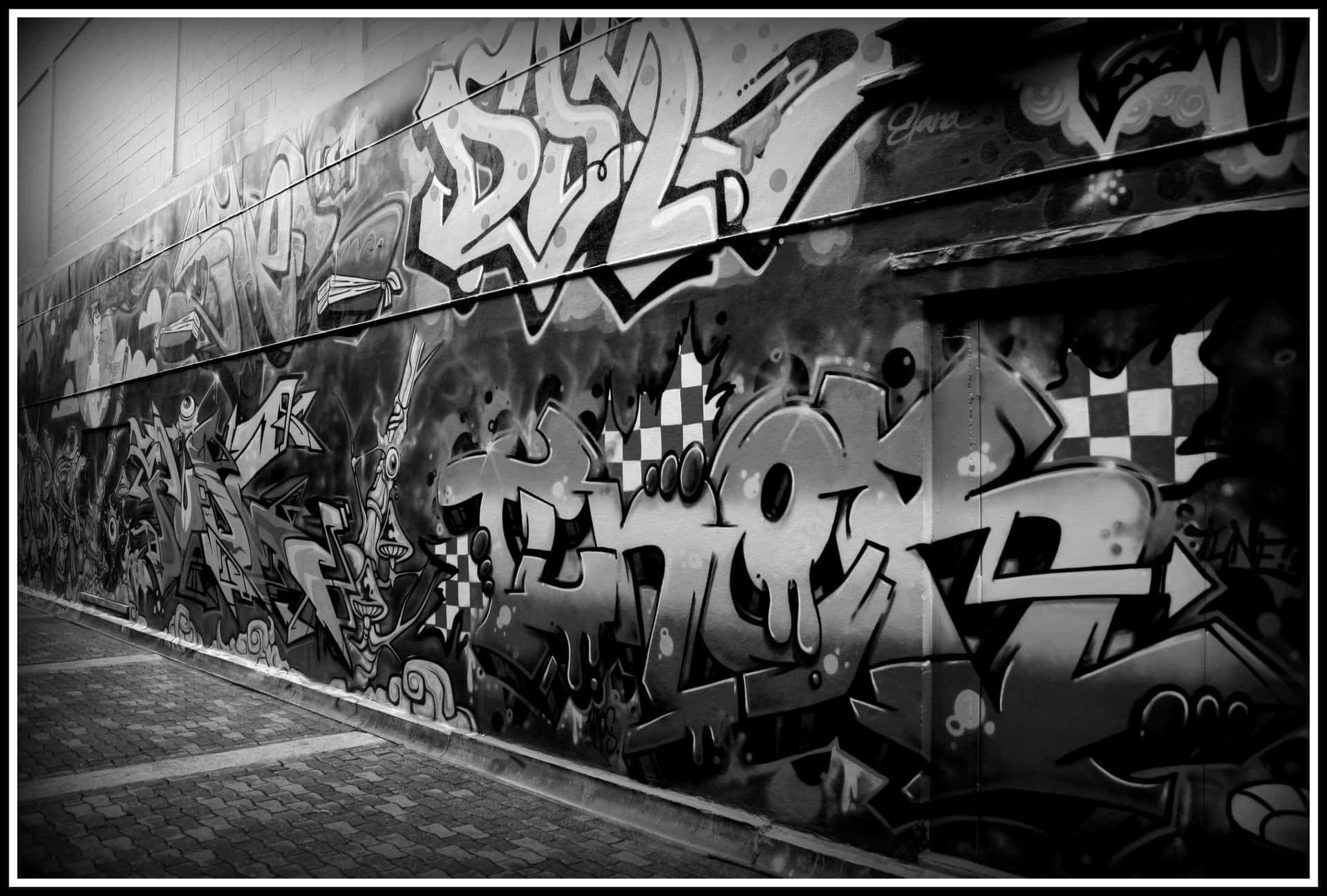 Captivating Black and White Graffiti Art Wallpaper