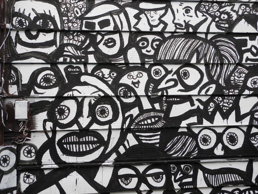 Schwarzweiße Graffiti-menschen Mit Hervorstechenden Augen Wallpaper