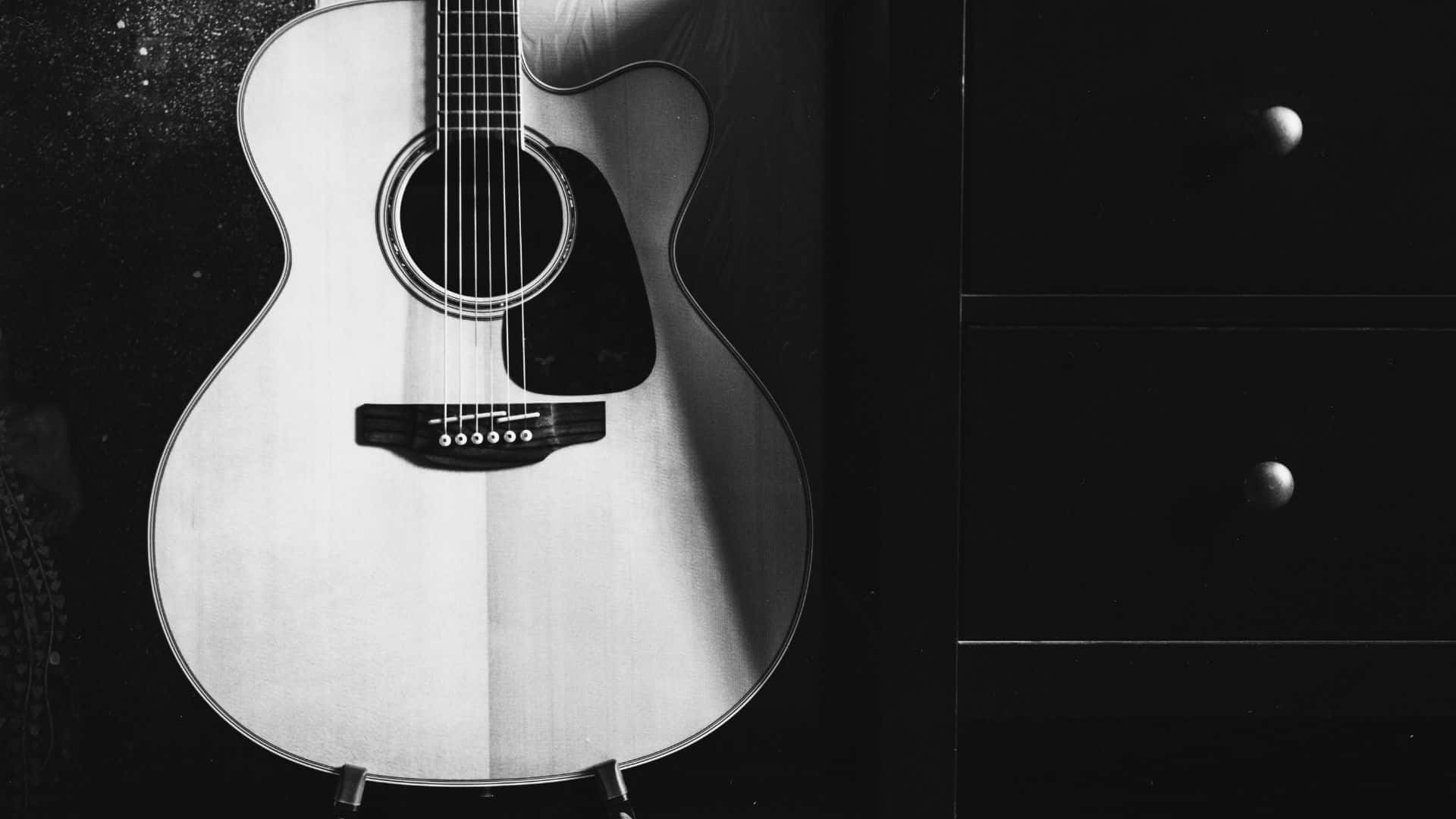 Captivating Black and White Guitar Wallpaper