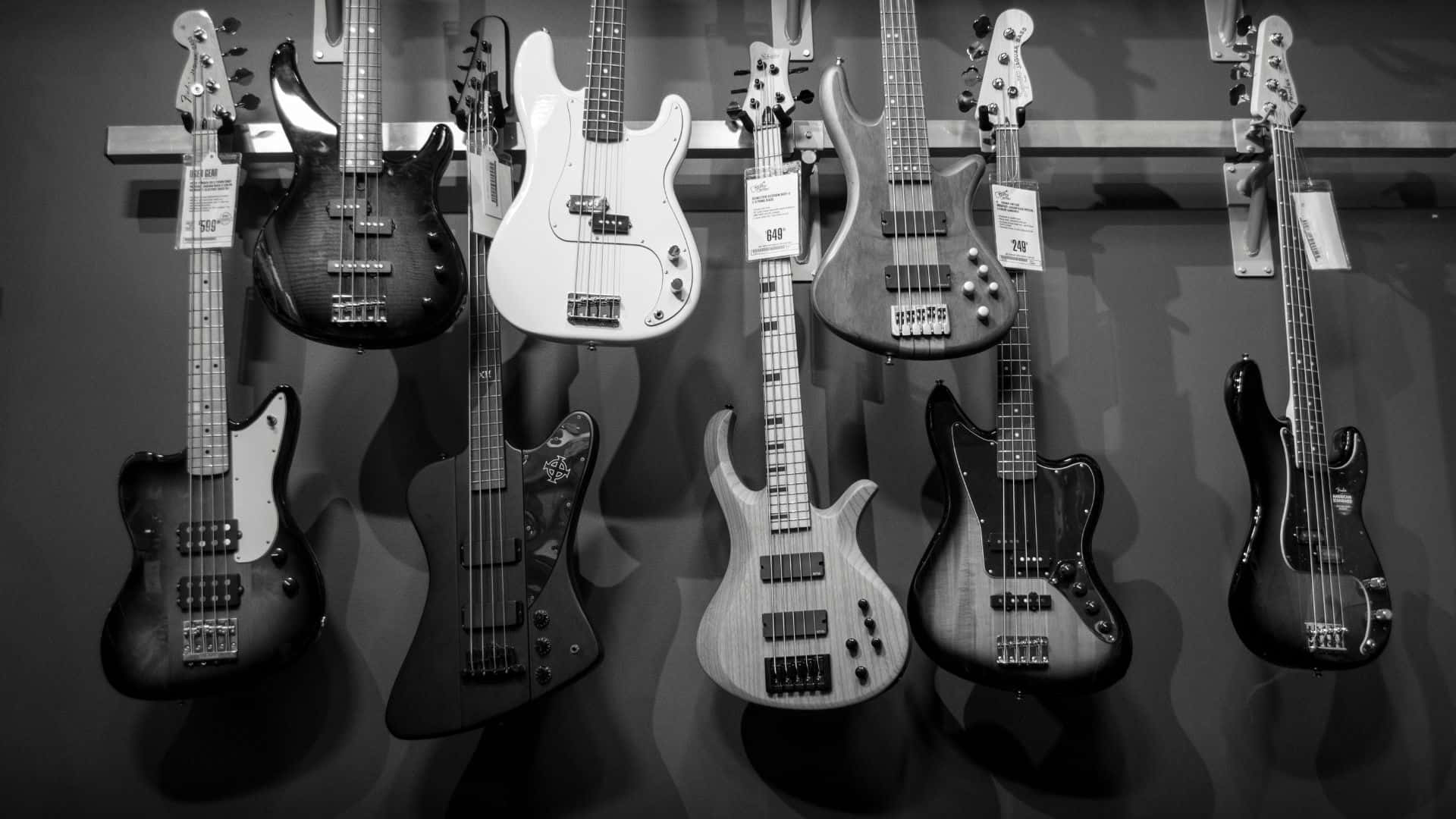 Striking Black and White Guitar on a Monochrome Background Wallpaper