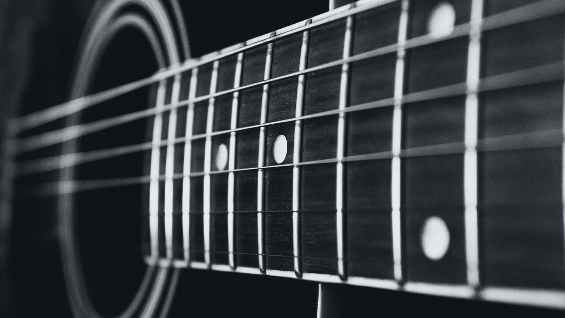Guitarraen Blanco Y Negro Fascinante. Fondo de pantalla