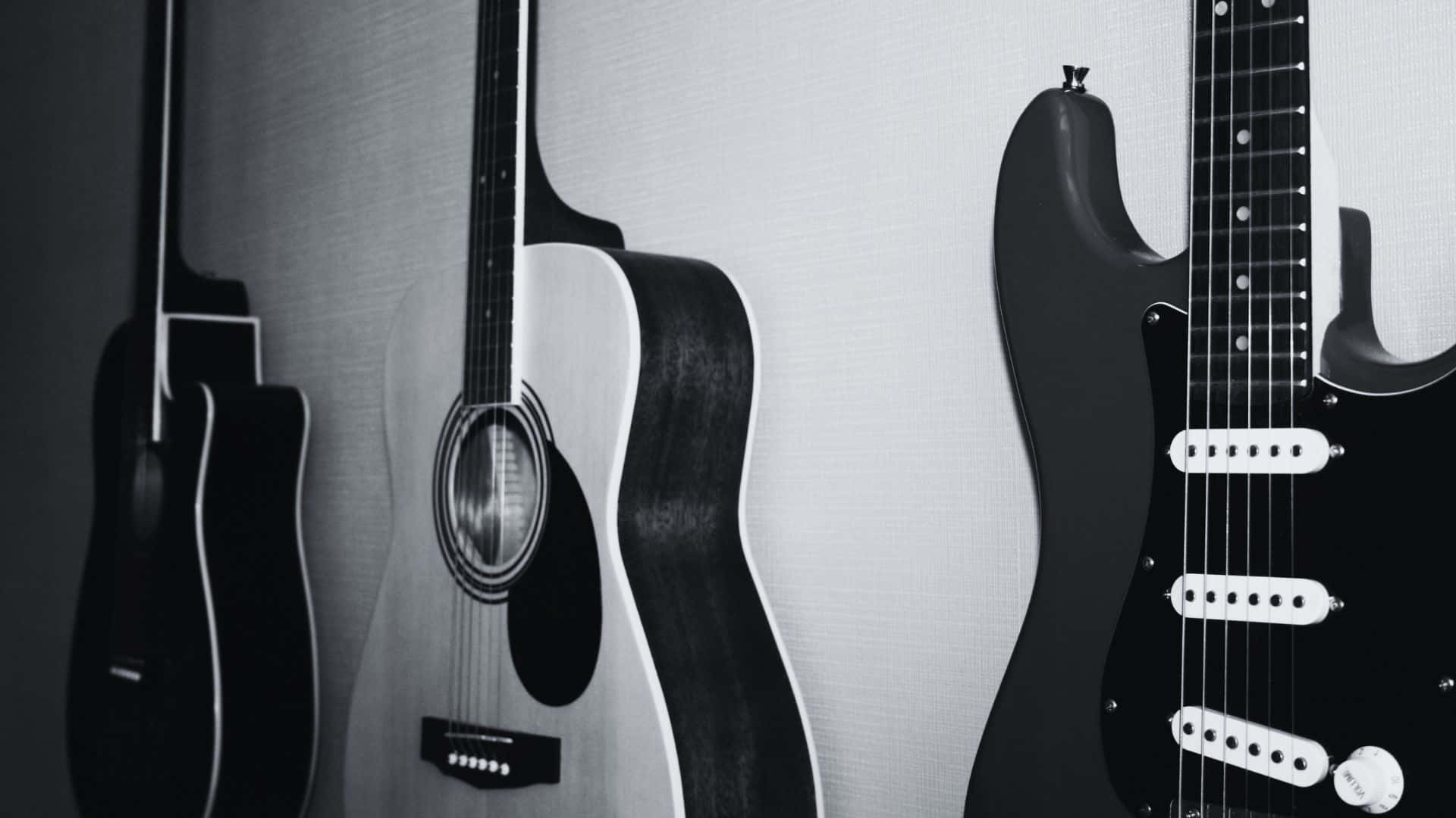 Expressive Black and White Guitar Wallpaper