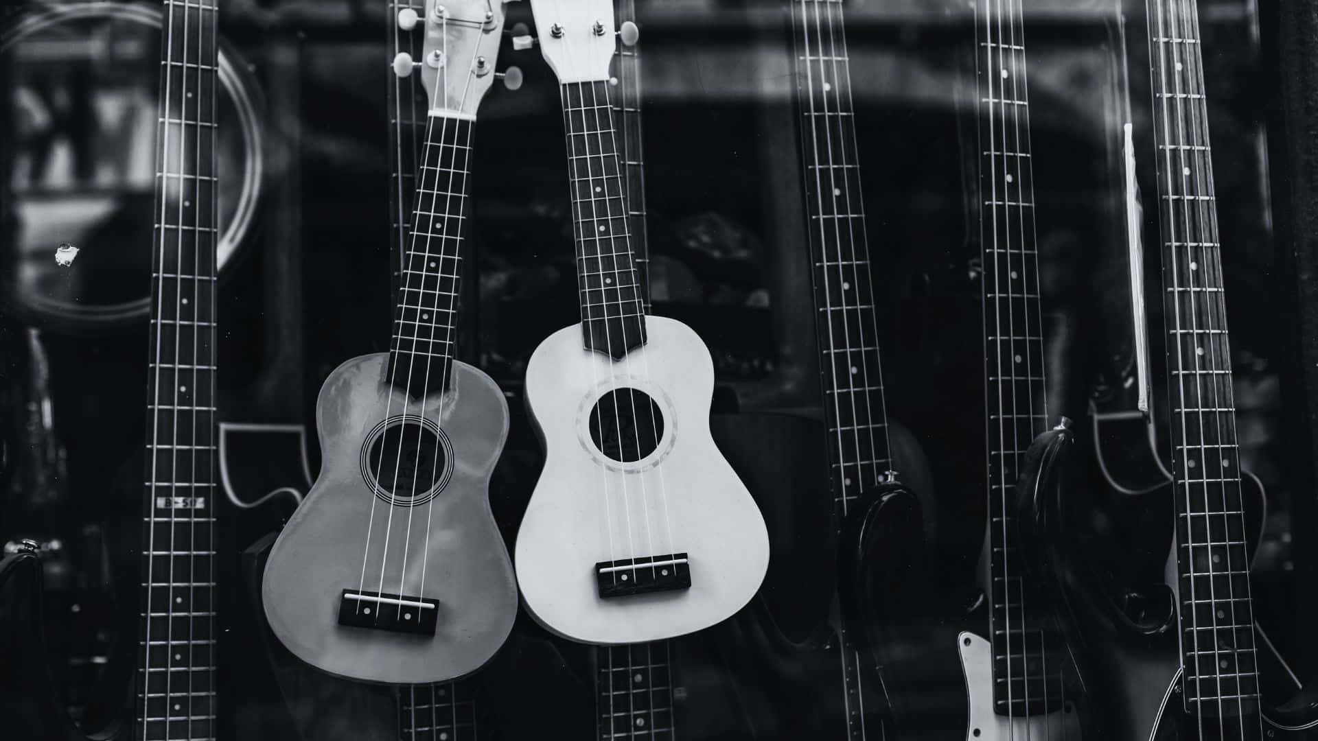 Unaelegante Obra Maestra De Una Guitarra En Blanco Y Negro Fondo de pantalla