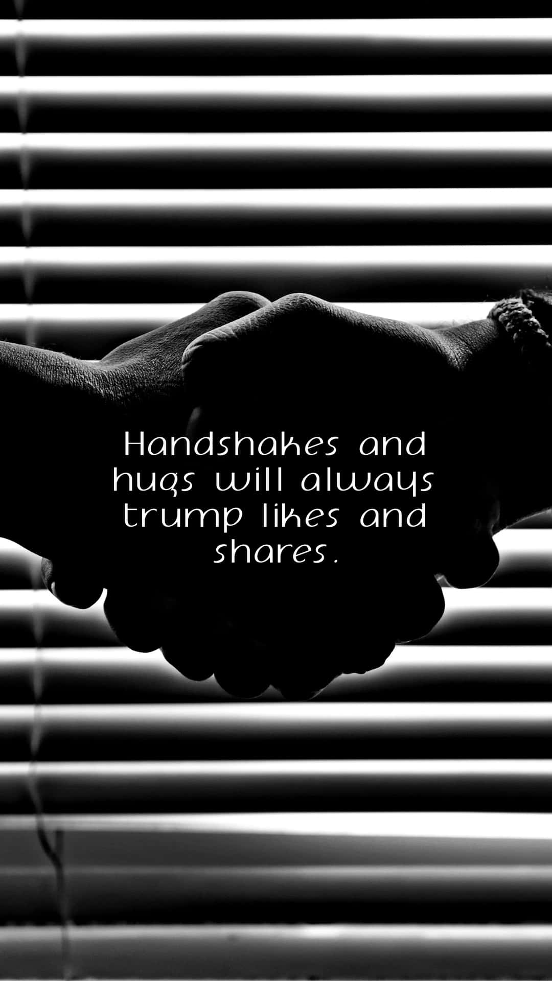 Handshake in Black and White with a Quote Wallpaper