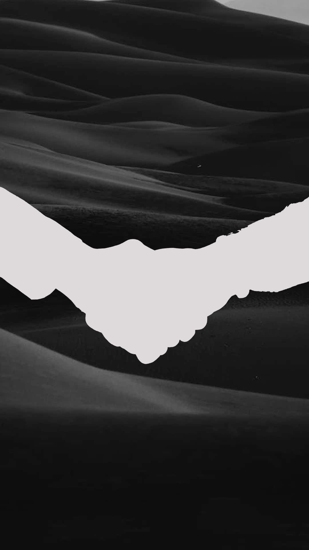 Uniting in Trust - A Black and White Handshake Wallpaper