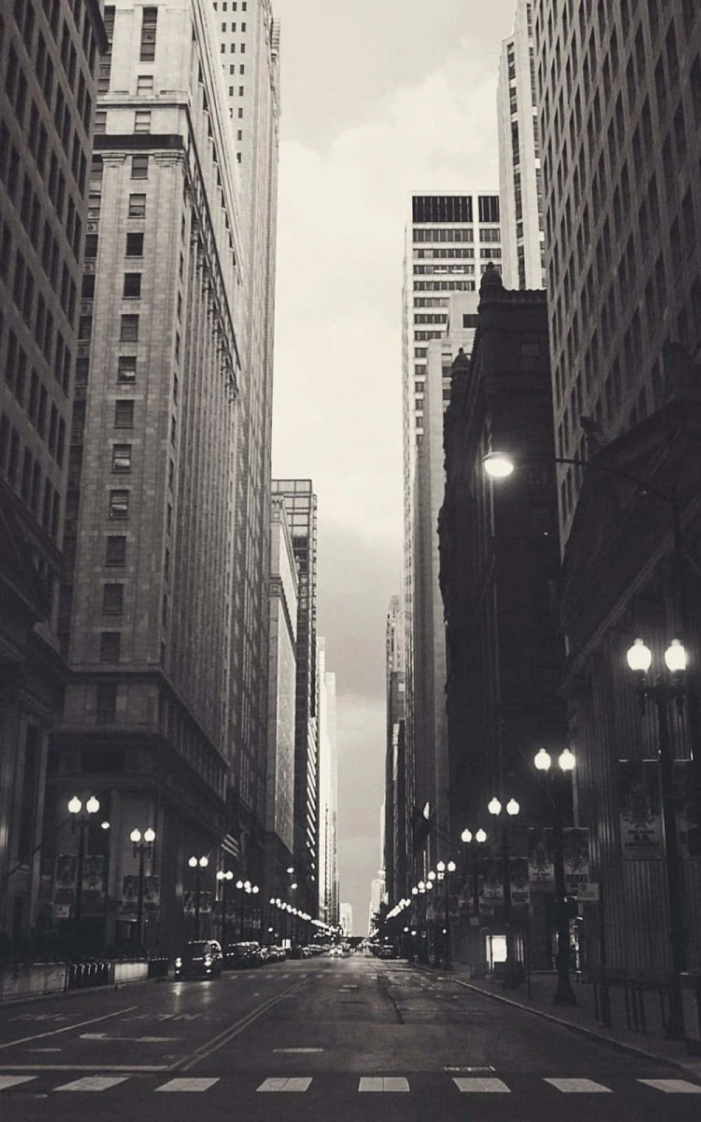 A Black And White Photo Of A City Street