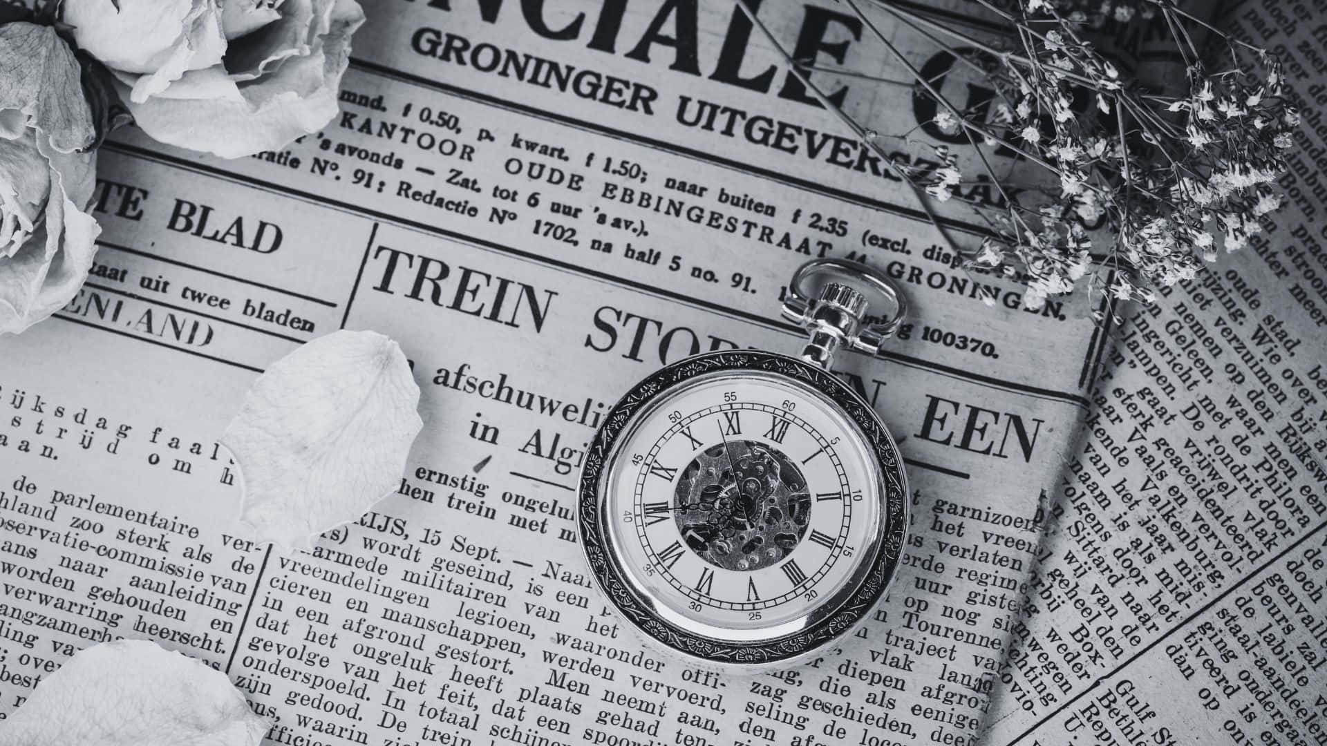 Vintage black and white newspaper on a wooden table Wallpaper