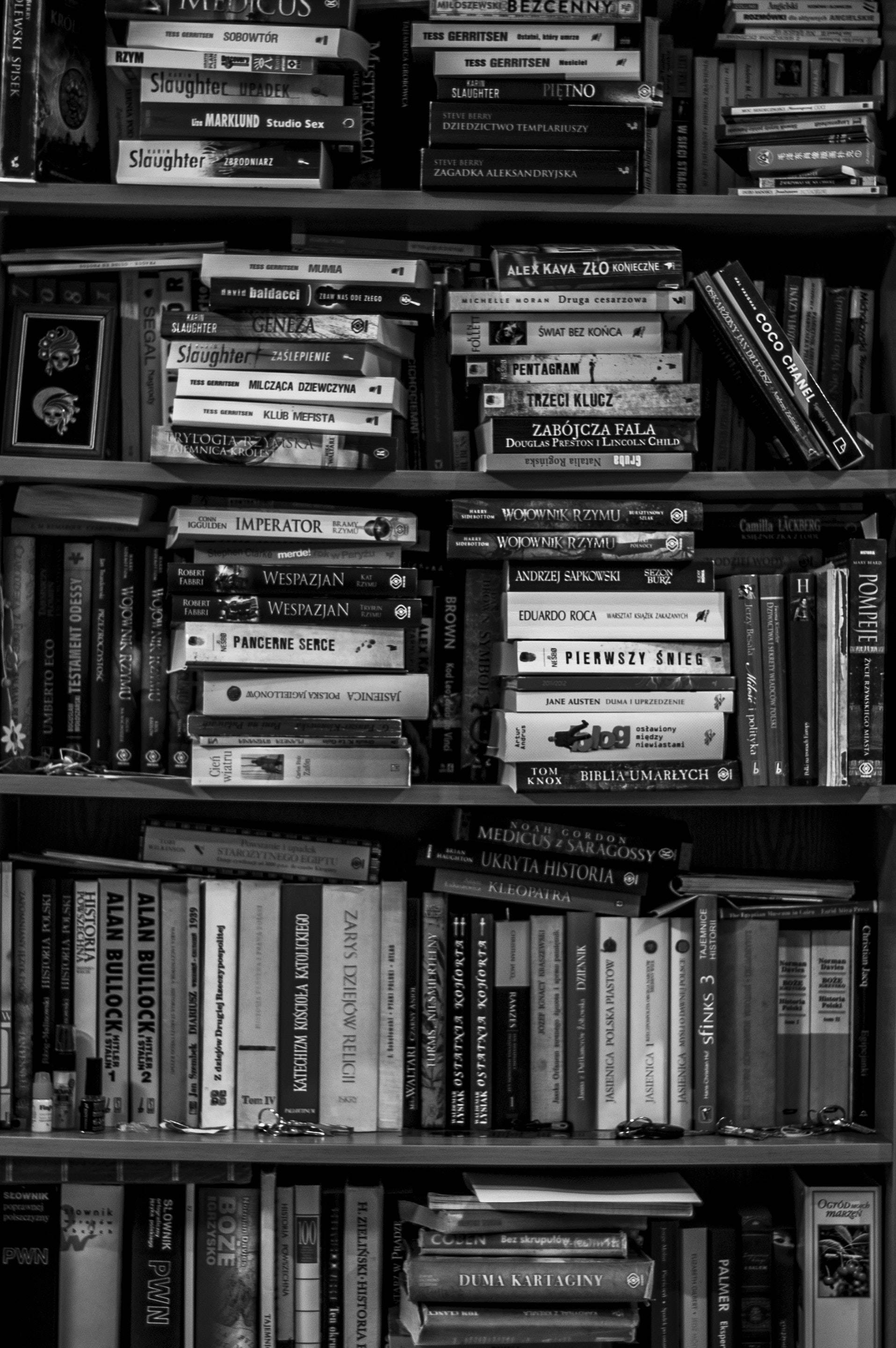 Black And White Photography Books On Shelf Wallpaper
