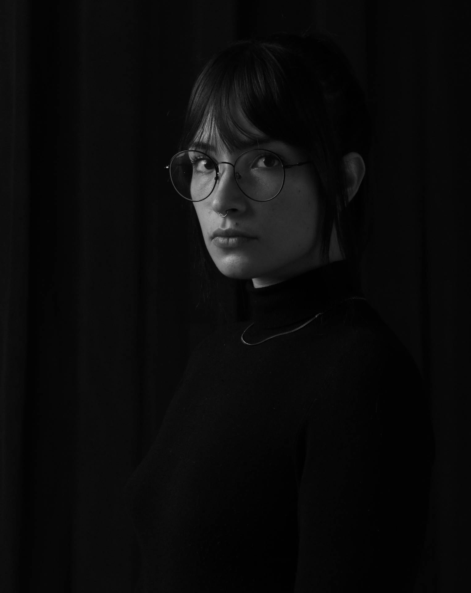 Black And White Portrait Of A Woman With Eyeglasses Wallpaper