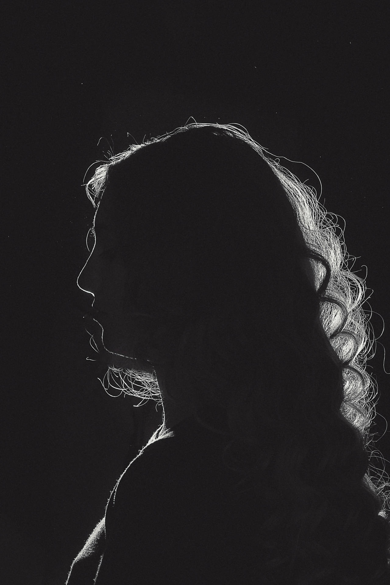Black And White Portrait Of A Woman’s Silhouette Wallpaper