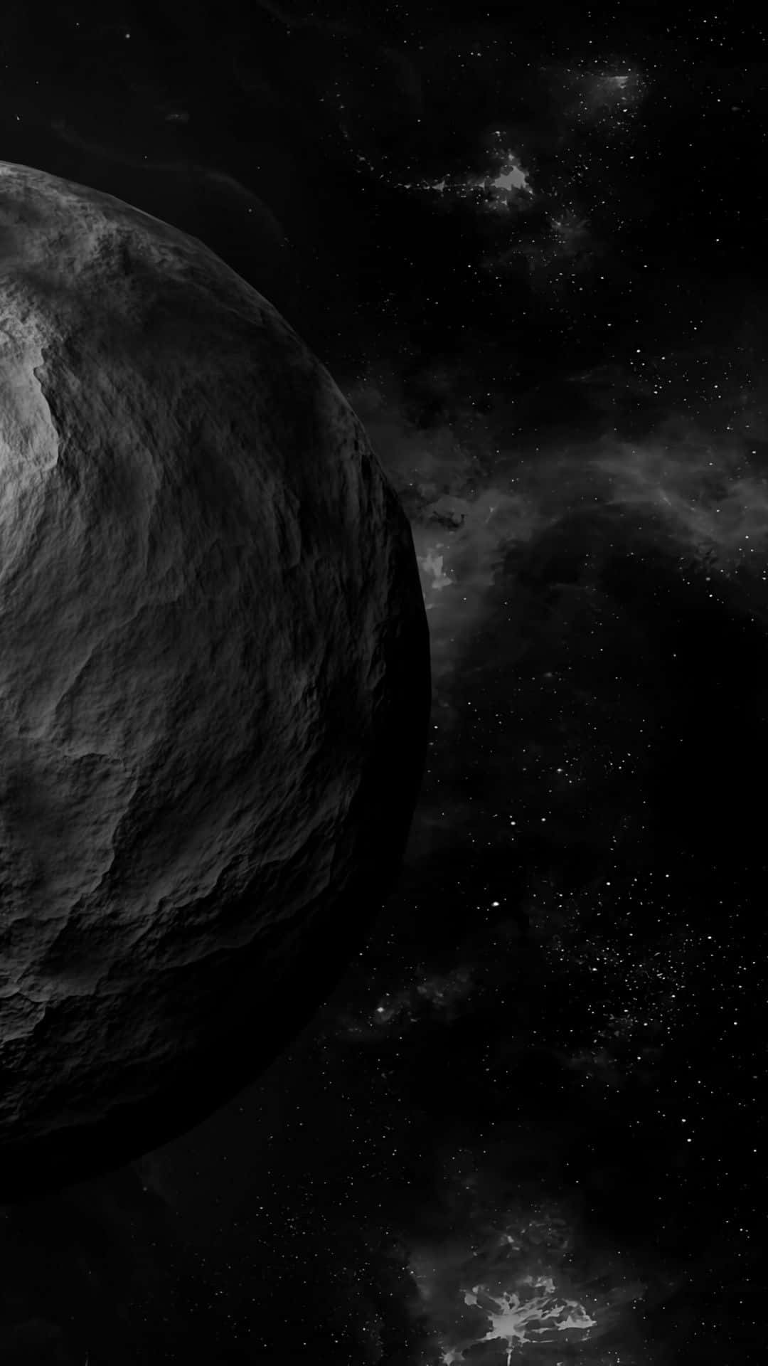 Et sort og hvidt billede af en stor planet. Wallpaper