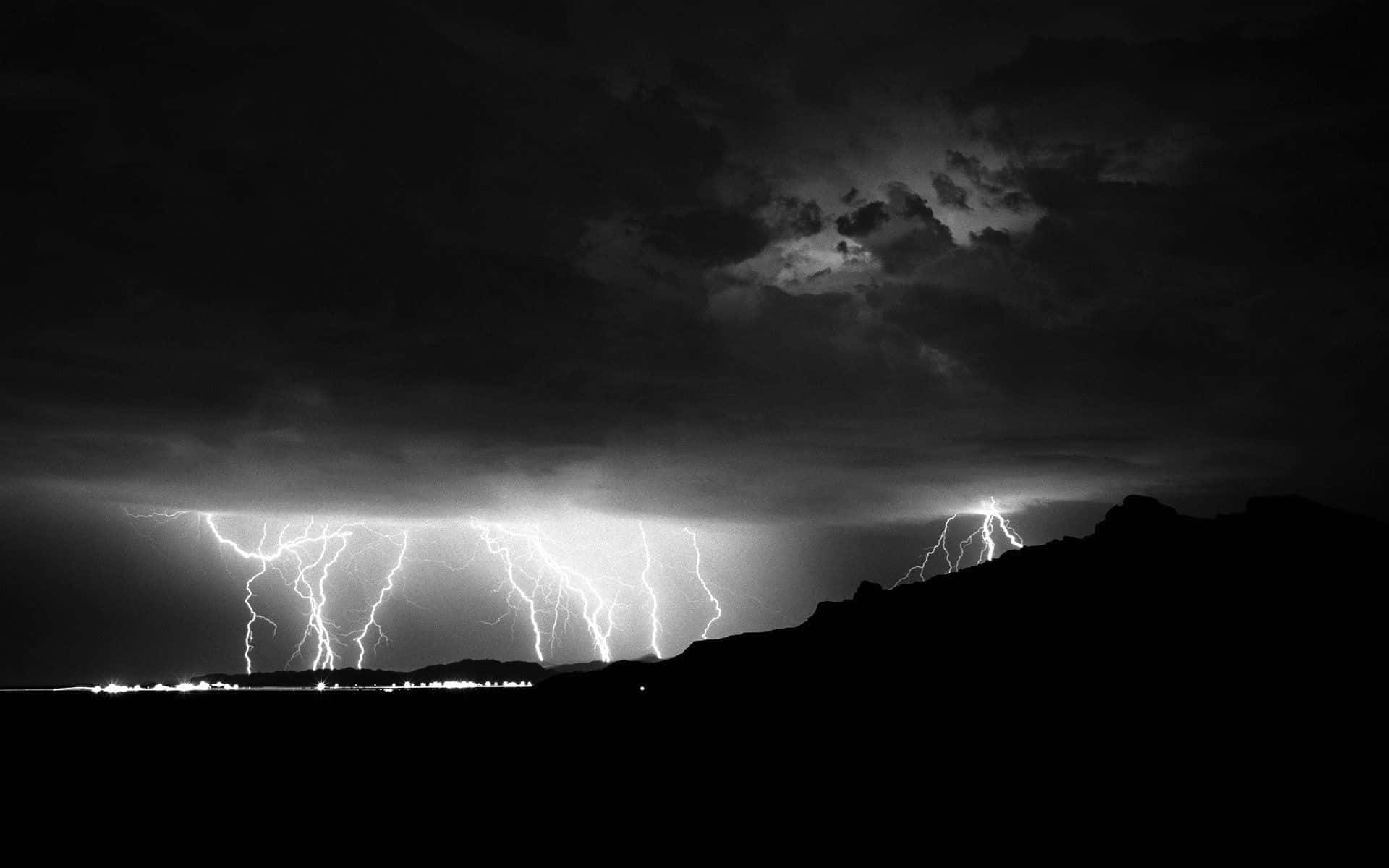 Dramatic Black and White Storm Clouds Wallpaper