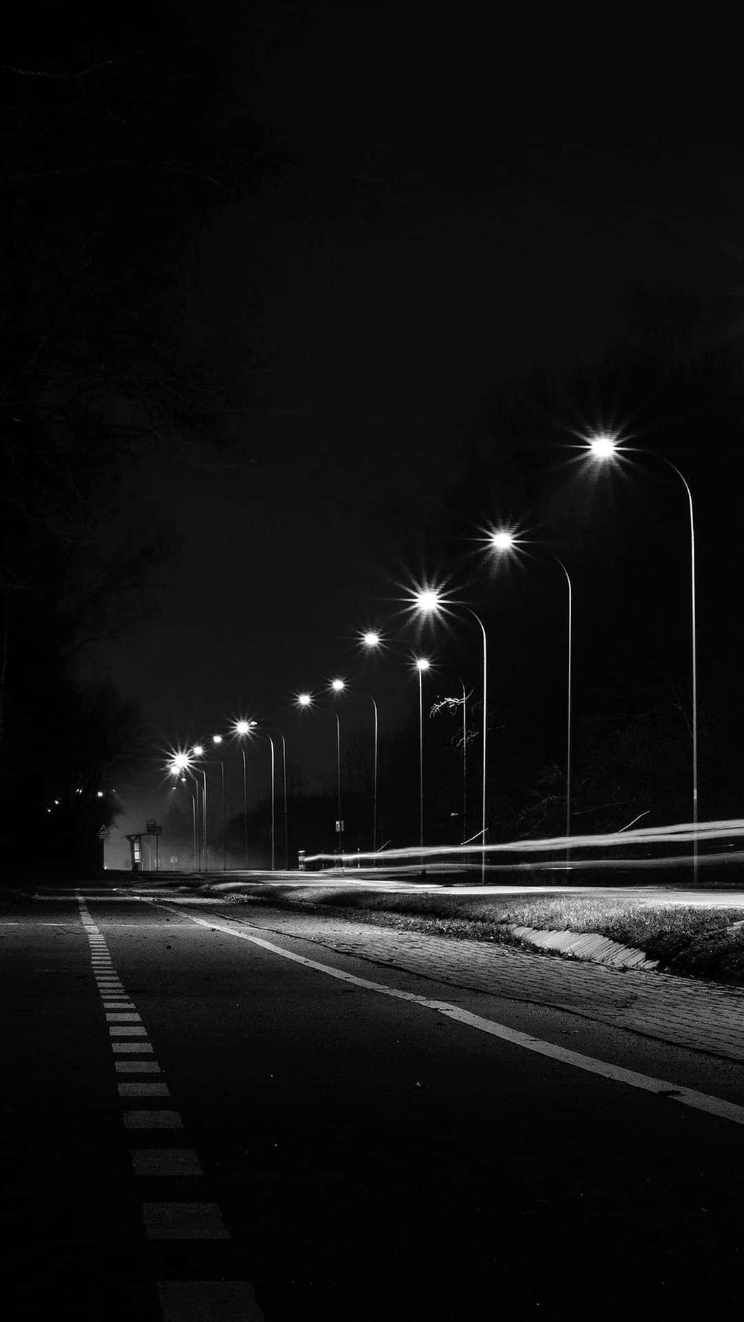 Mysterious black and white city street Wallpaper