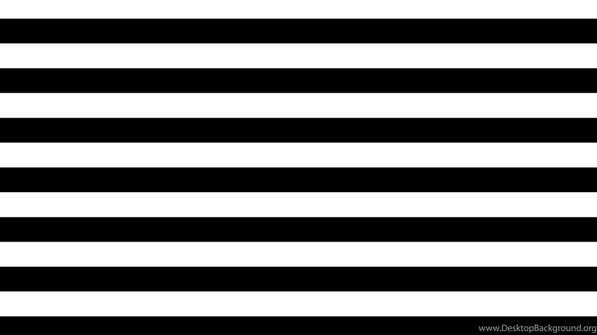 A bold black and white striped background