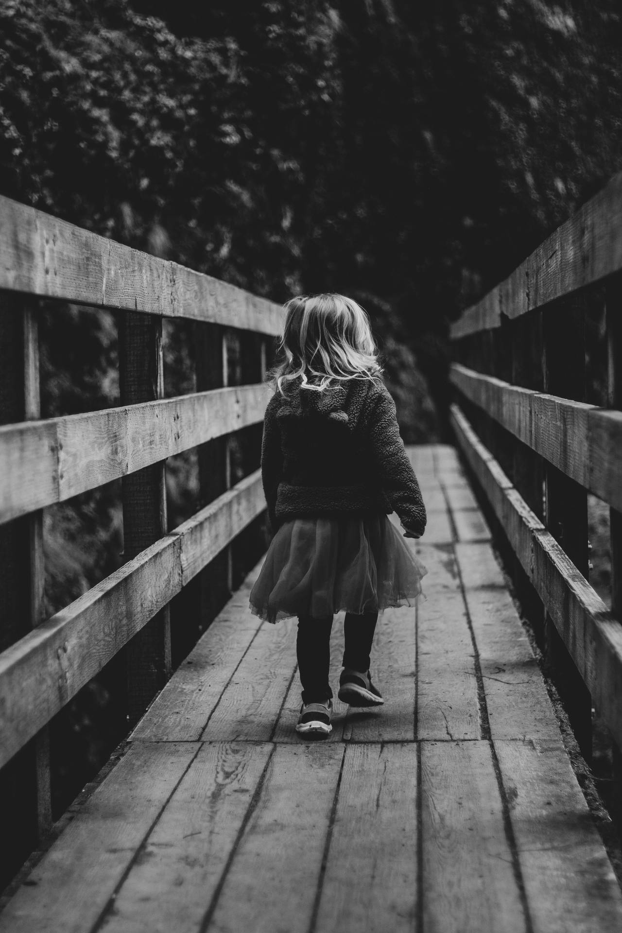 Wanderlust - Girl Walking Alone in Black and White Wallpaper