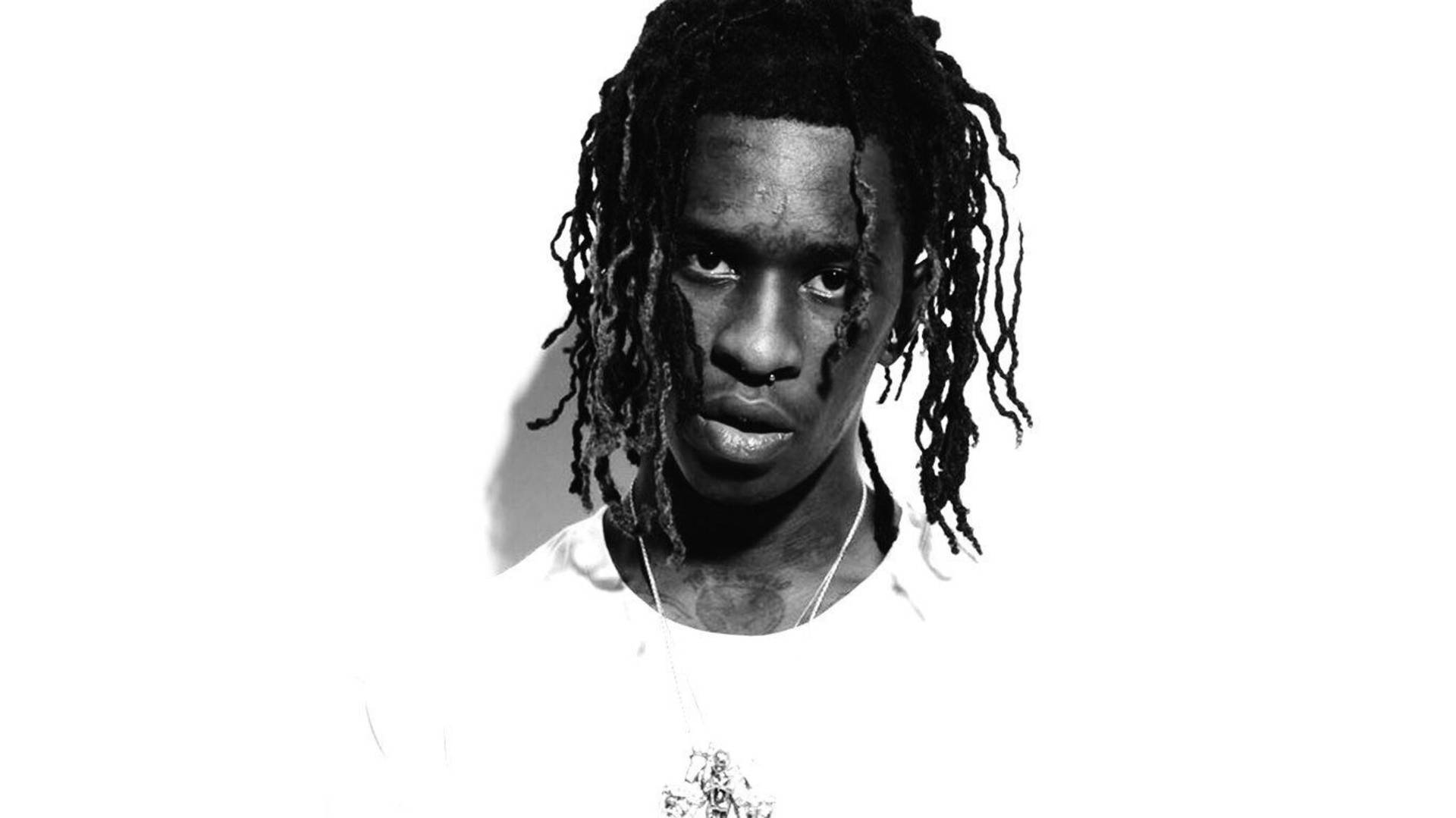 Young Thug showing off his signature style. Wallpaper