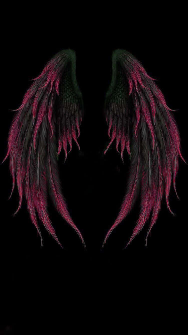 Angelic black wings against a dark background