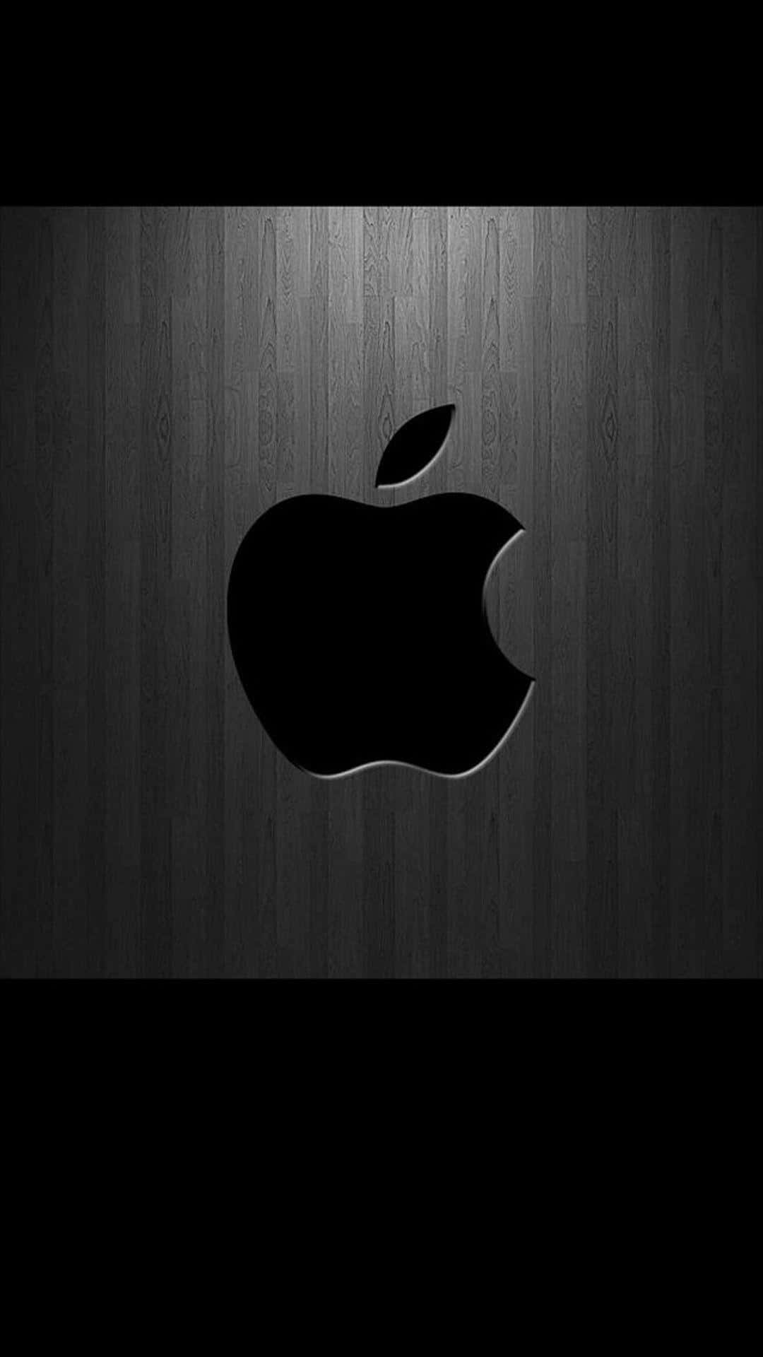 Logotipode Apple Negro En Madera Gris. Fondo de pantalla