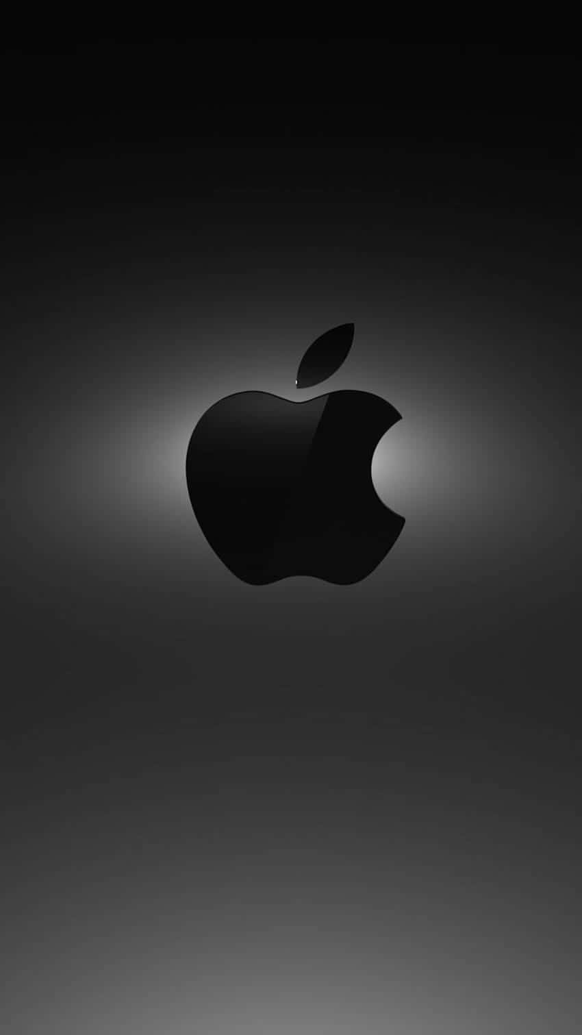 The iconic Apple logo in sleek black Wallpaper