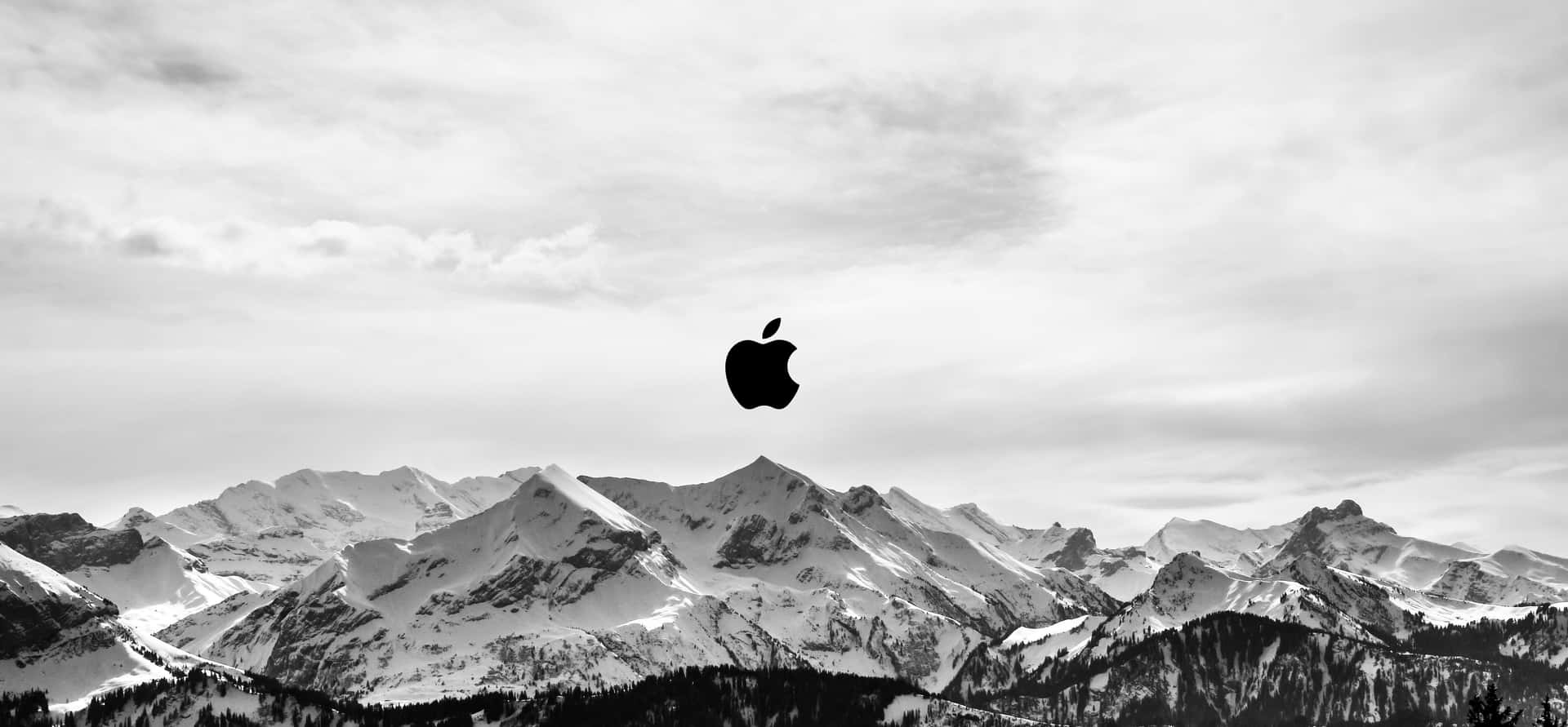 Black Apple Logo Over A Mountain Wallpaper