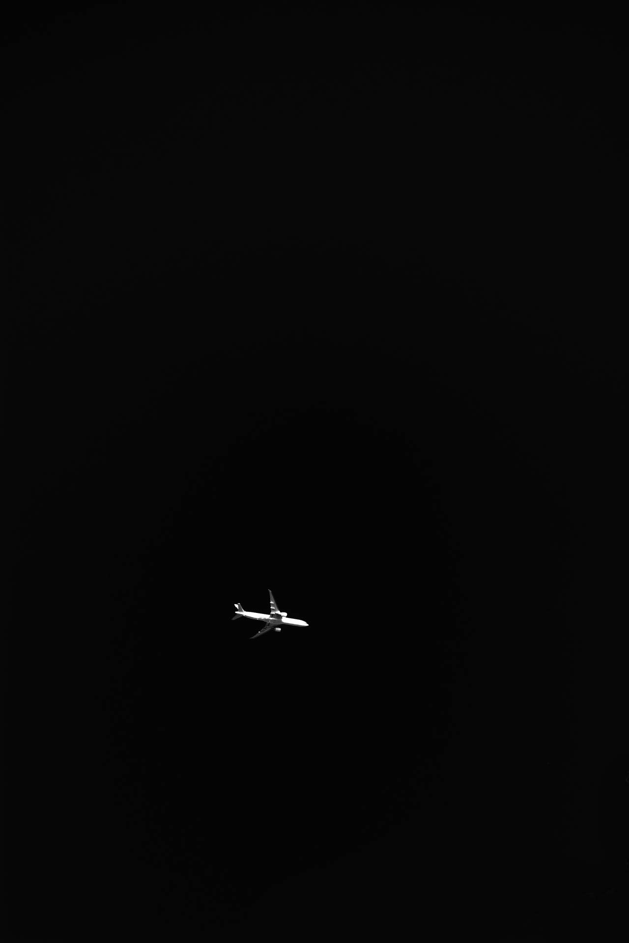 Black Background With White Airplane