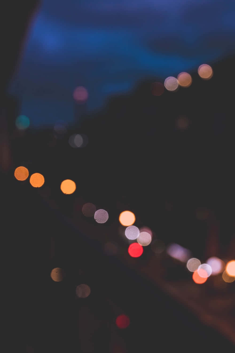 Blurred Lights In The City At Night Wallpaper