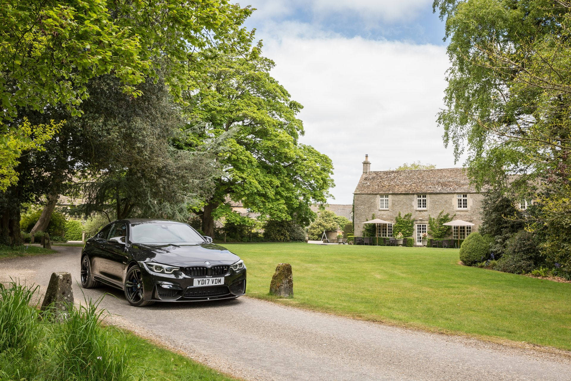 Black BMW M4 And Country House Wallpaper