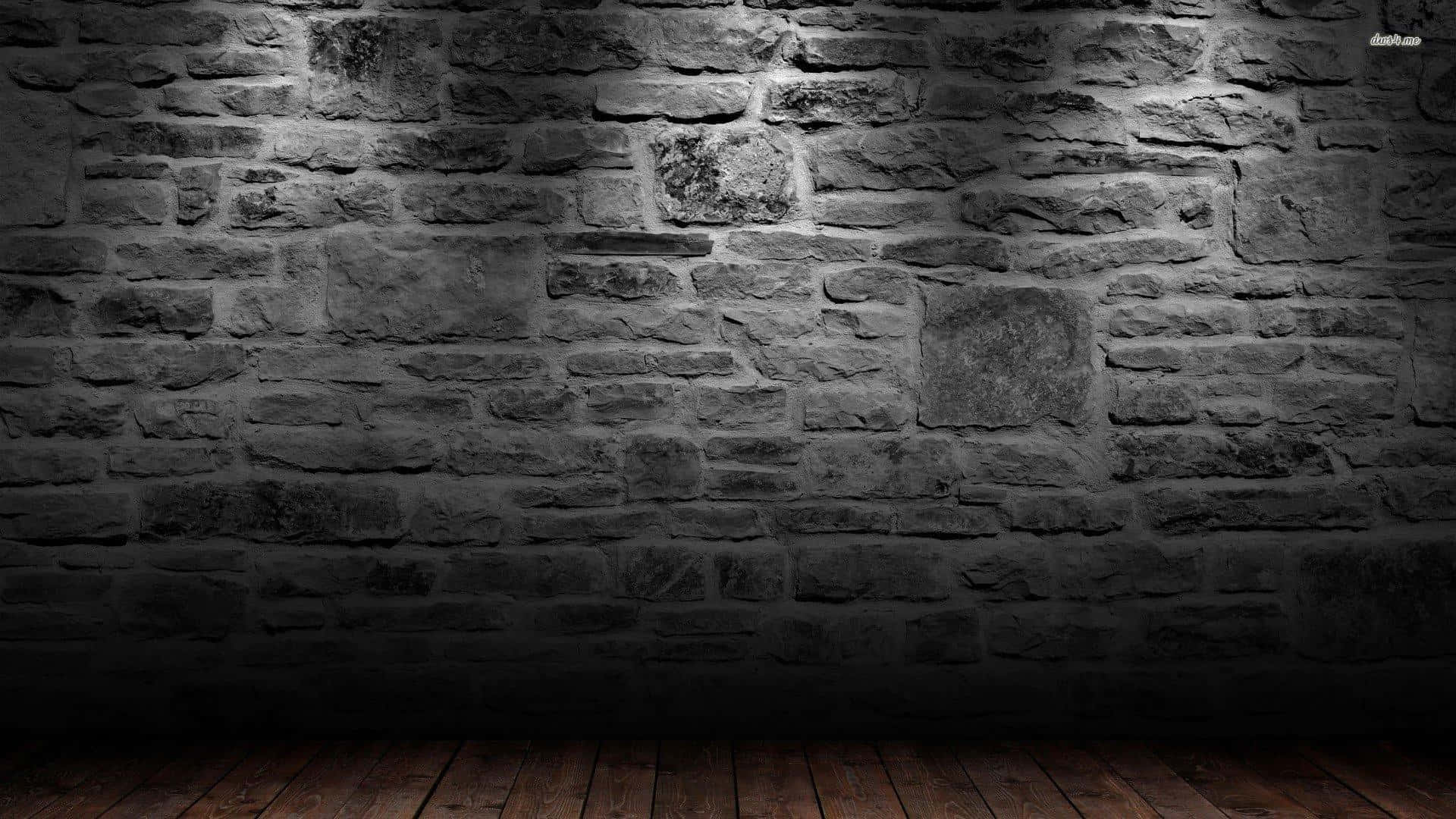 A Dark Room With A Stone Wall And Wooden Floor