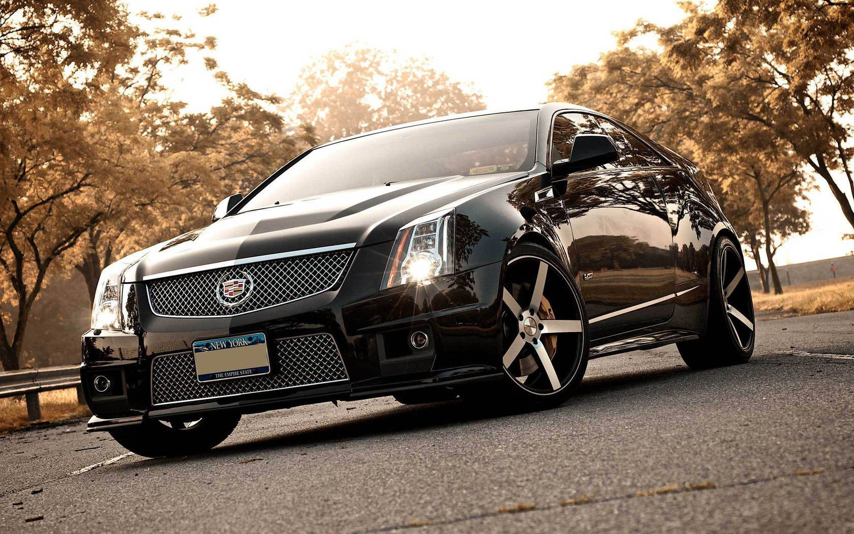 Black Cadillac Coupe Outdoors Wallpaper
