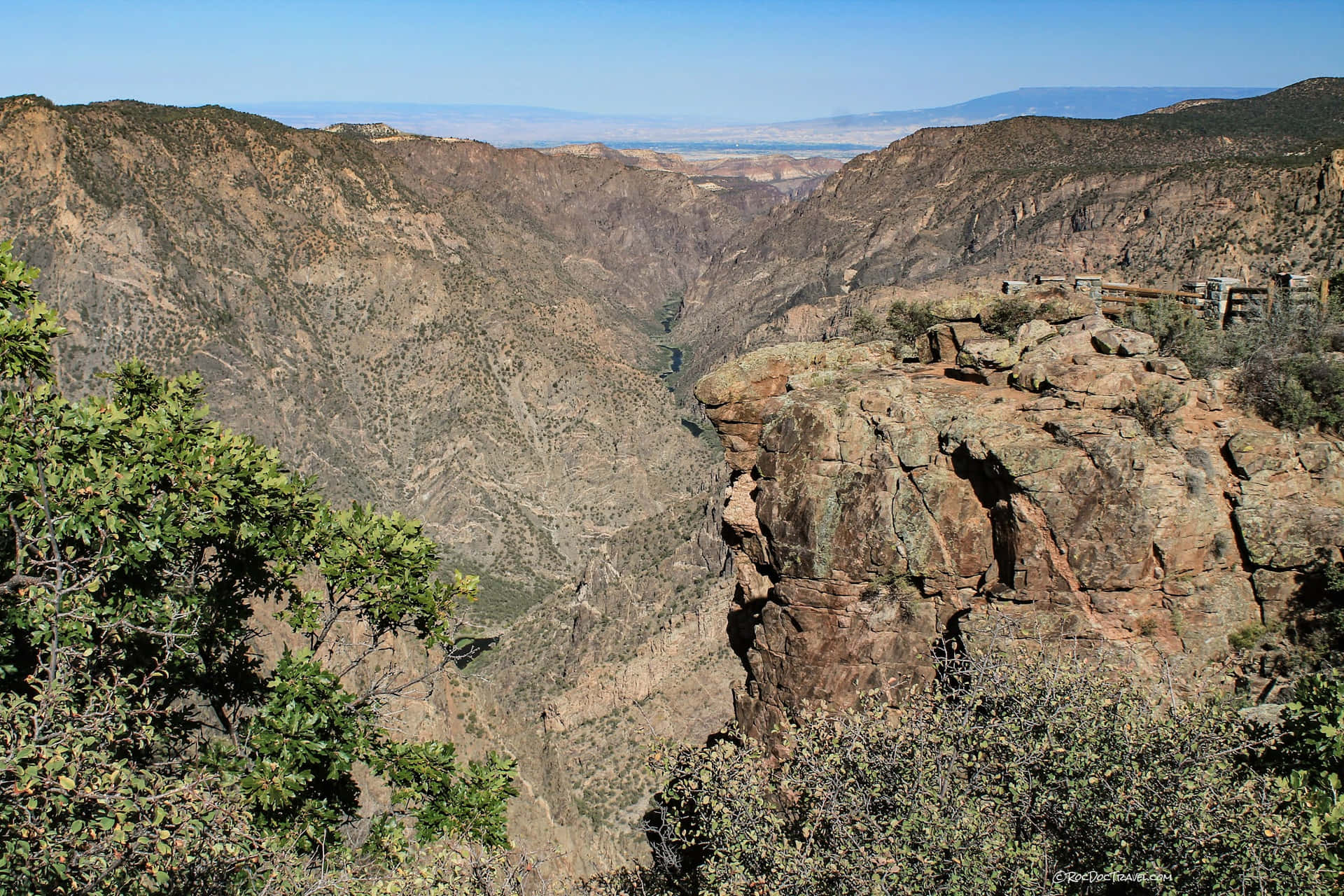 Captivating Black Canyon Surrounded by Desert Landscape Wallpaper