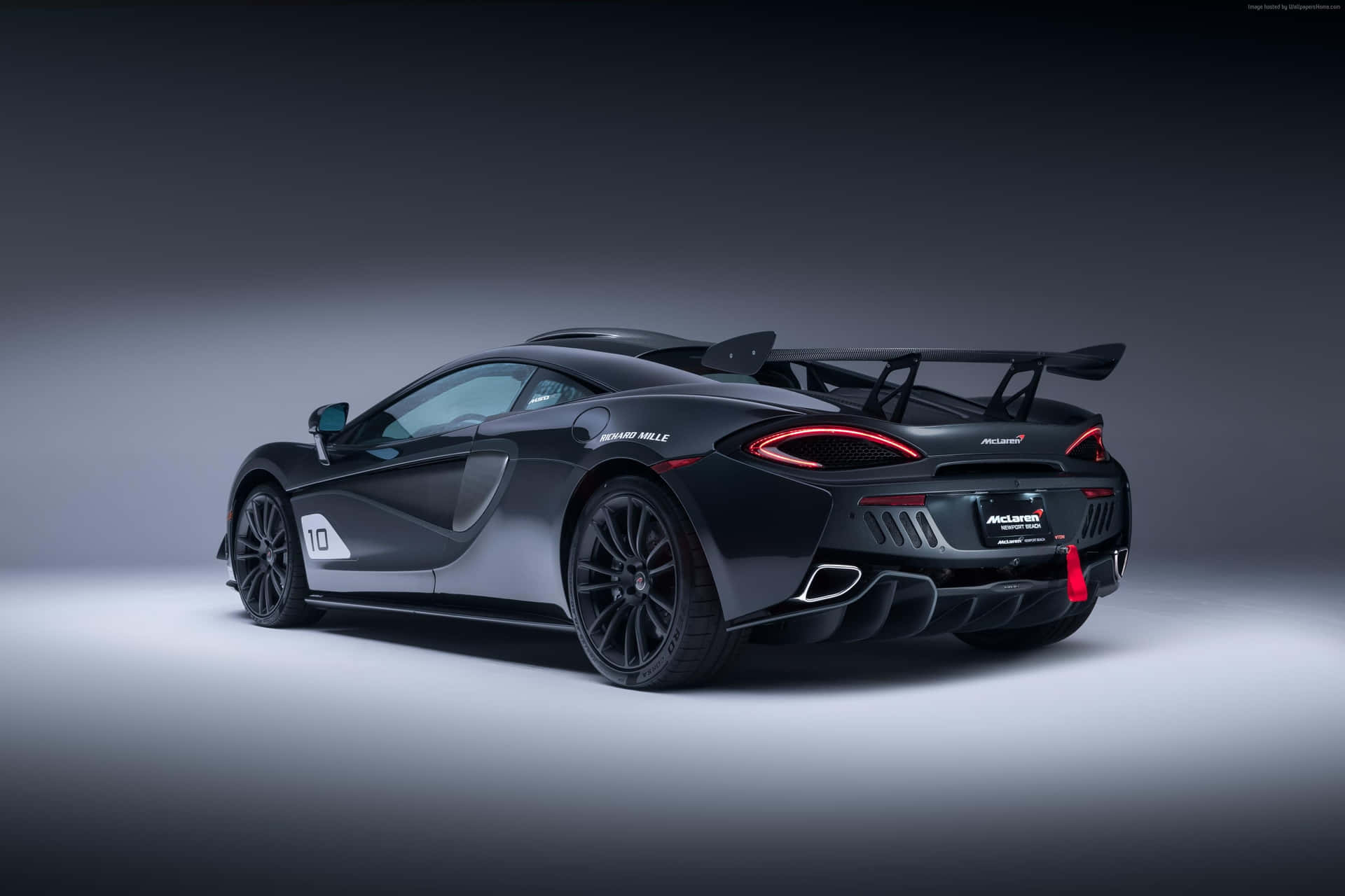 "A Bold Black 4K Car Ready for a Whole New Level of Luxury" Wallpaper
